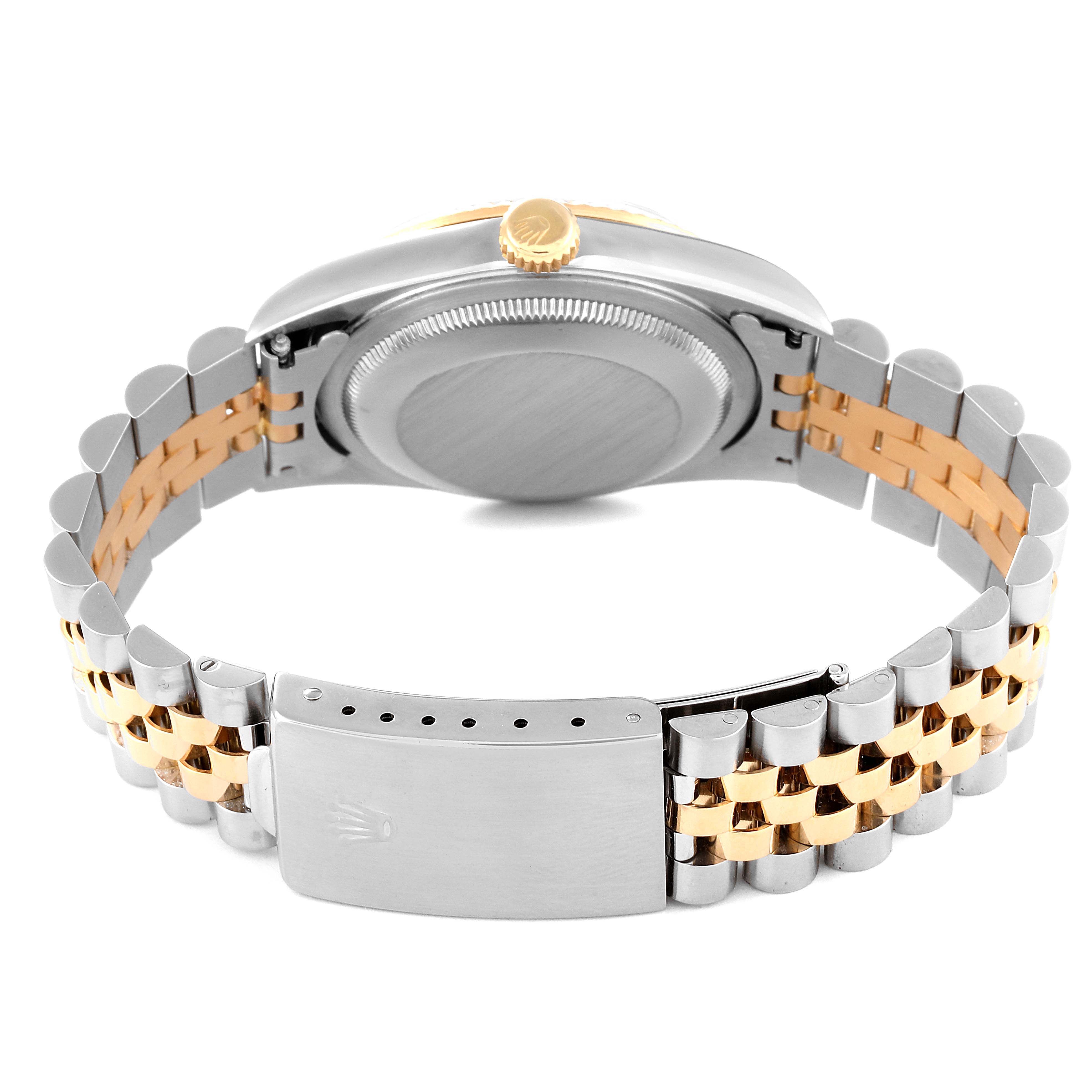 This image shows the back case and clasp of a Rolex Datejust 16233 Men's Steel and Gold (two tone) Champagne Dial 16233 Men's Steel and Gold (two tone) Champagne Dial watch at a rear angle, highlighting the two-tone bracelet.