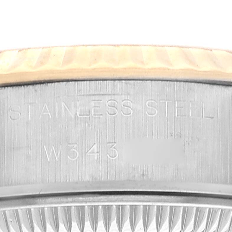 This image shows a close-up of the case back of a Rolex Datejust 69173 Women's Steel and Gold (two tone) White Dial 69173 Women's Steel and Gold (two tone) White Dial watch, highlighting the stainless steel with engraved text.