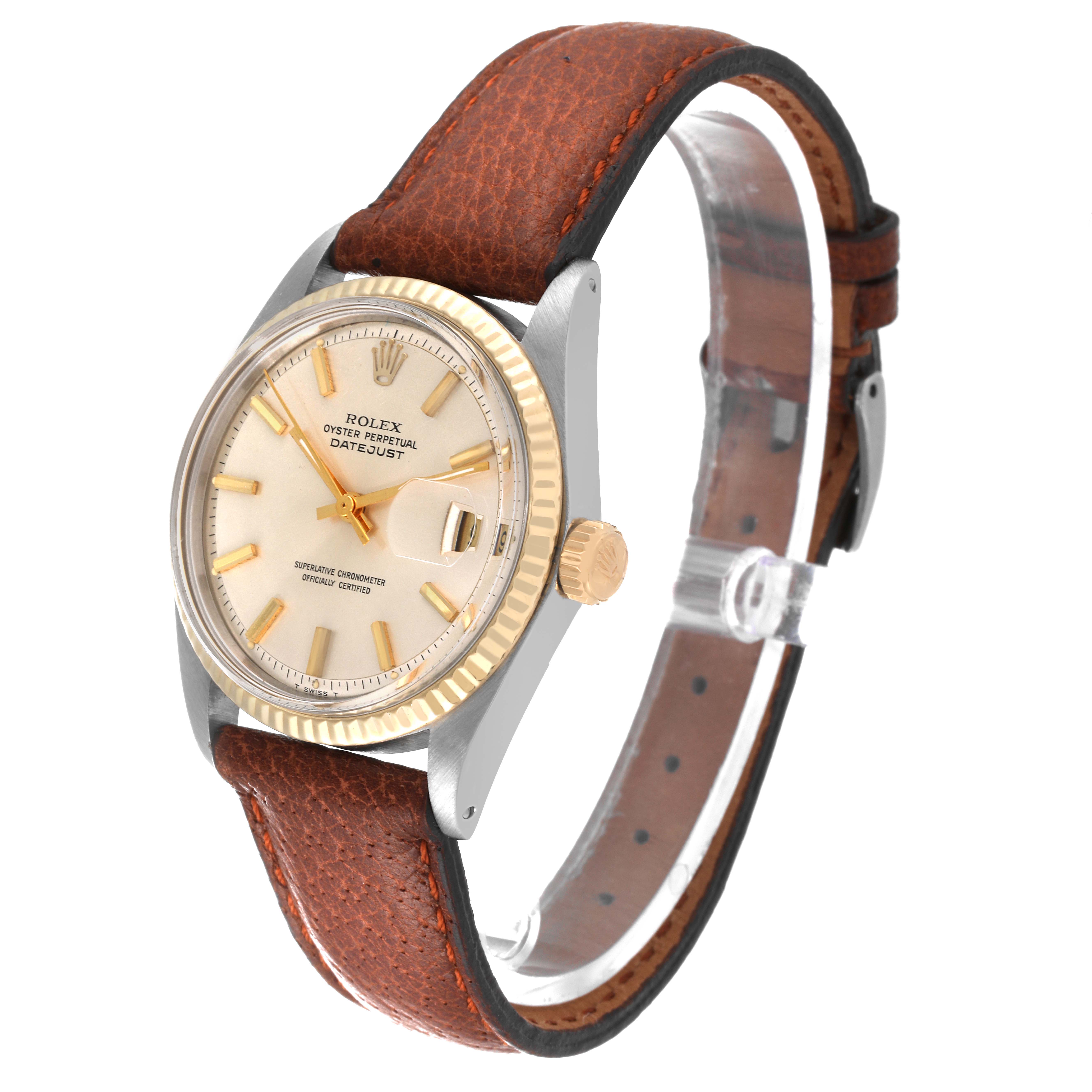 The Rolex Vintage Collection 1601 Men's Steel and Gold (two tone) Silver Dial 1601 Men's Steel and Gold (two tone) Silver Dial watch is shown at a slight angle highlighting the face, crown, and brown leather strap.
