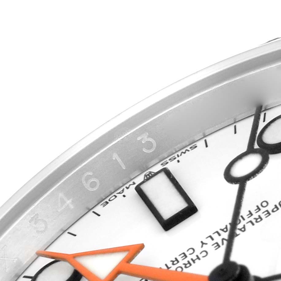 The image shows a close-up of the dial and bezel of a Rolex Explorer 226570 Men's Stainless Steel White Dial 226570 Men's Stainless Steel White Dial watch, featuring the hour markers and part of the minute hand.