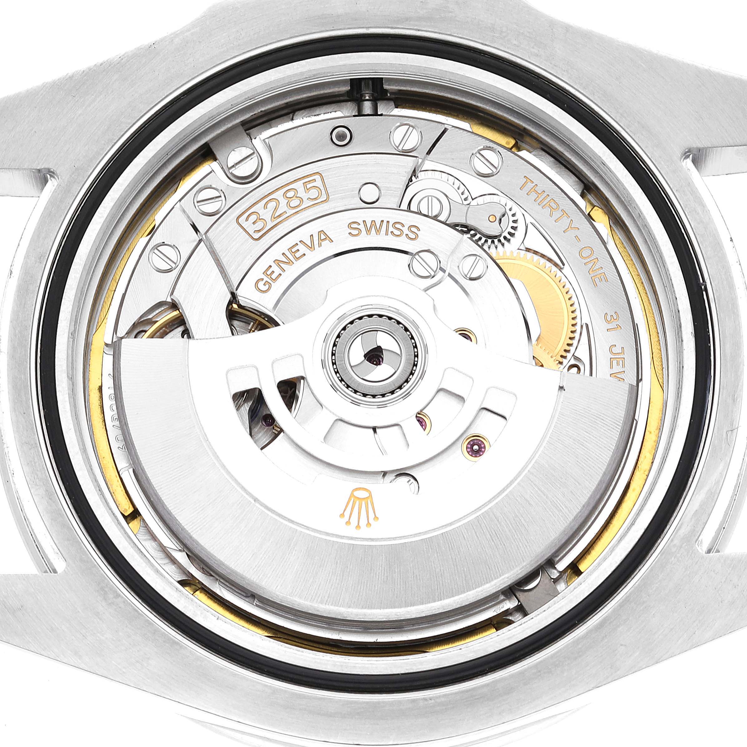 The image shows a close-up view of the movement mechanism in a Rolex Explorer 226570 Men's Stainless Steel White Dial 226570 Men's Stainless Steel White Dial watch, highlighting its intricate parts and detailing.