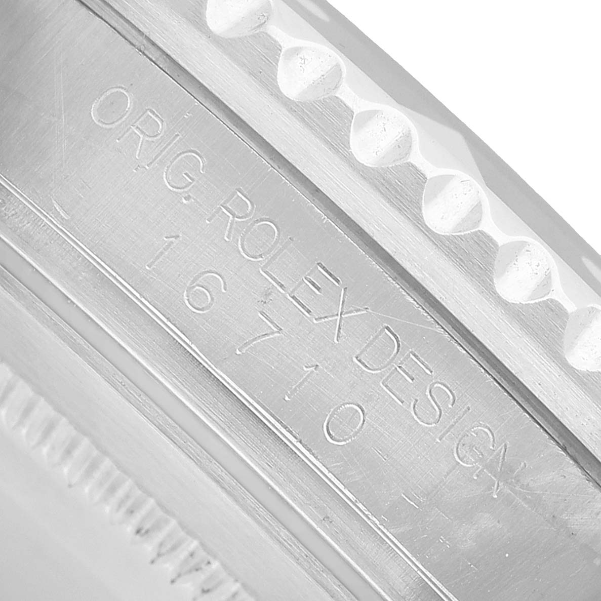 The image shows a close-up of the case side, highlighting the "Orig. Rolex Design 16710" engraving of the Rolex GMT-Master 16710 Men's Stainless Steel Black Dial.