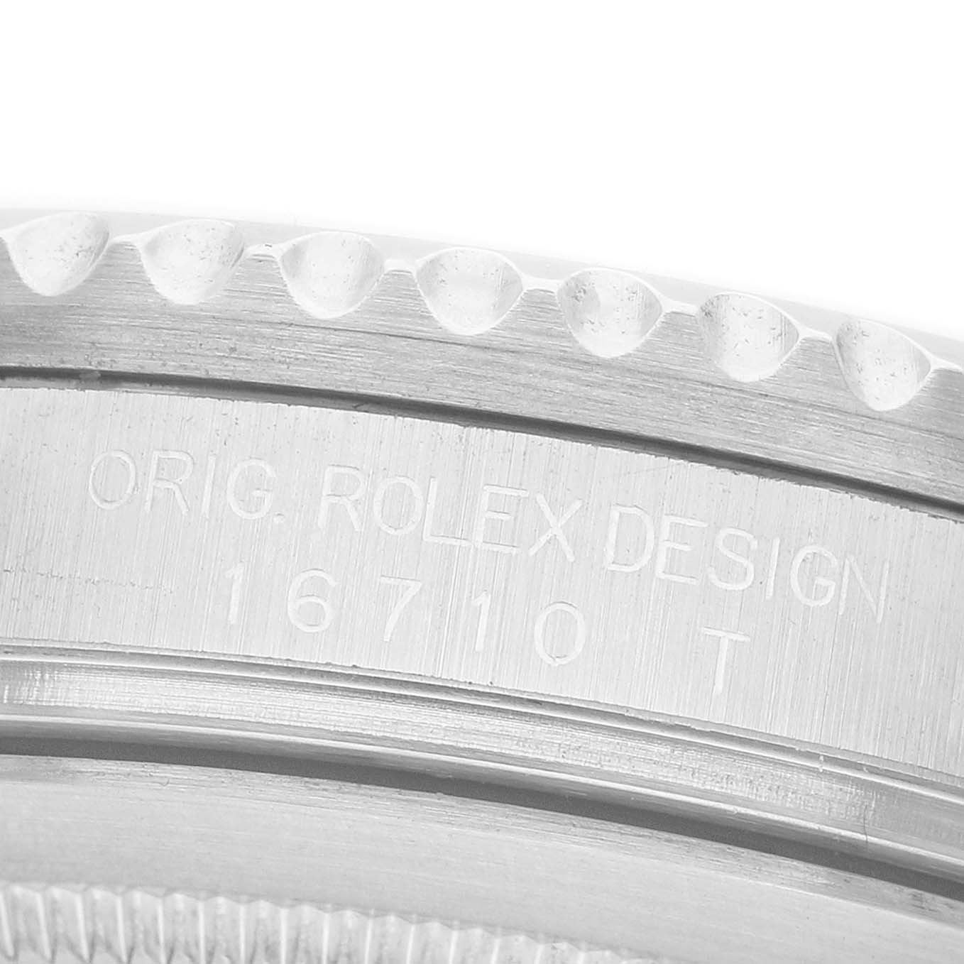 The image shows a close-up of the bezel and case side of a Rolex GMT-Master 16710 Men's Stainless Steel Black Dial, featuring engraved model details.