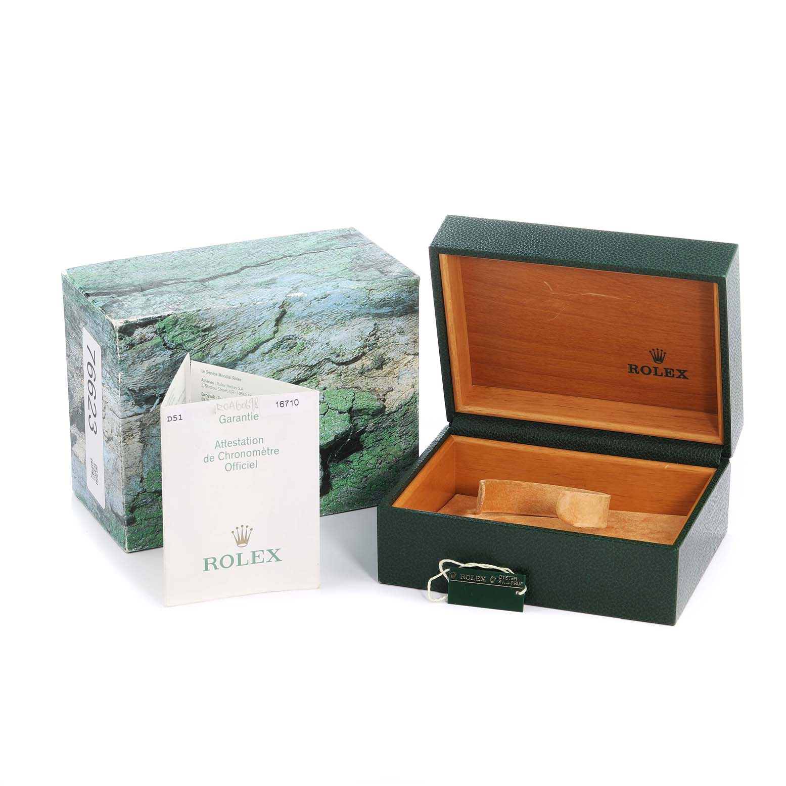 The image shows a Rolex GMT-Master 16710 Men's Stainless Steel Black Dial accessory set, including a green box, outer box, instruction booklet, and hang tag.