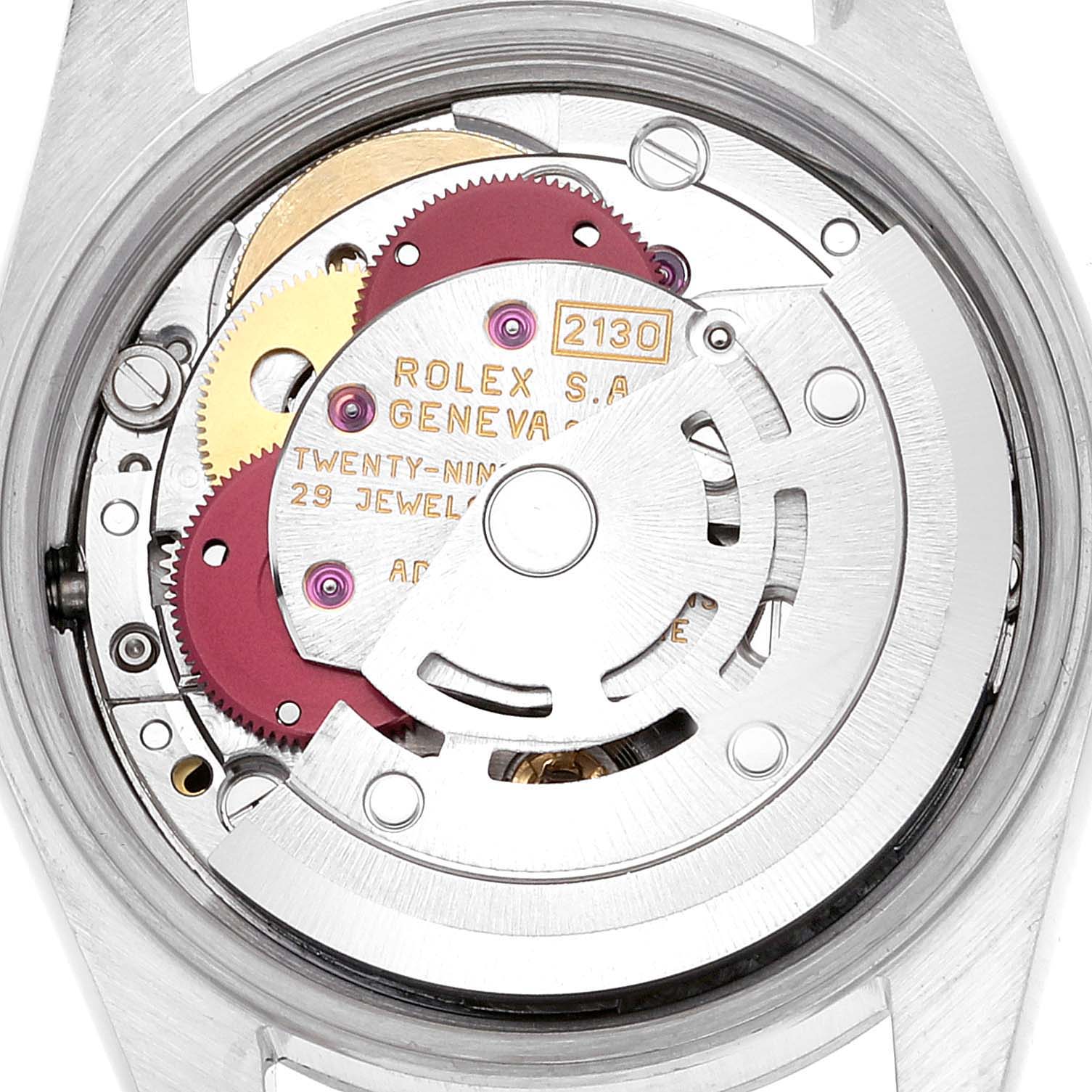 This image shows the inner mechanism and movement of the Rolex Oyster Perpetual 67180 Women
s Stainless Steel Pink Dial 67180 Women
s Stainless Steel Pink Dial watch from a top-down angle.