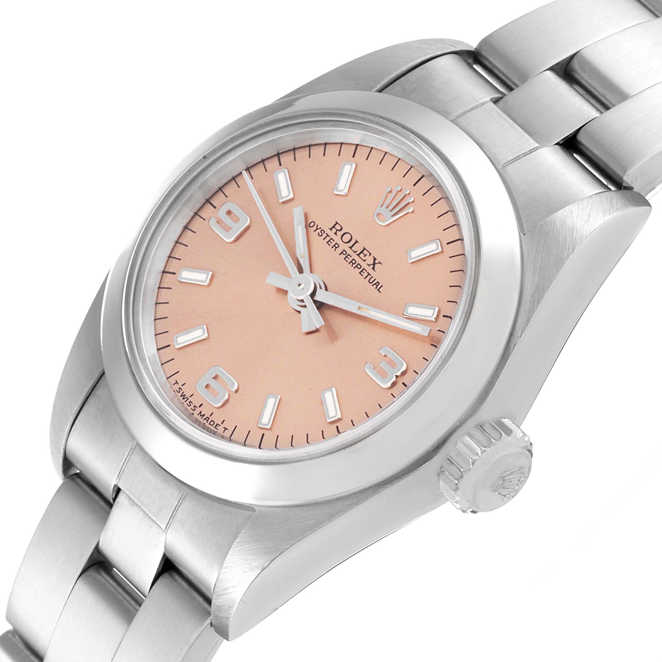 This image shows a close-up angle of the Rolex Oyster Perpetual 67180 Women
s Stainless Steel Pink Dial 67180 Women
s Stainless Steel Pink Dial watch, featuring its dial, crown, and bracelet.