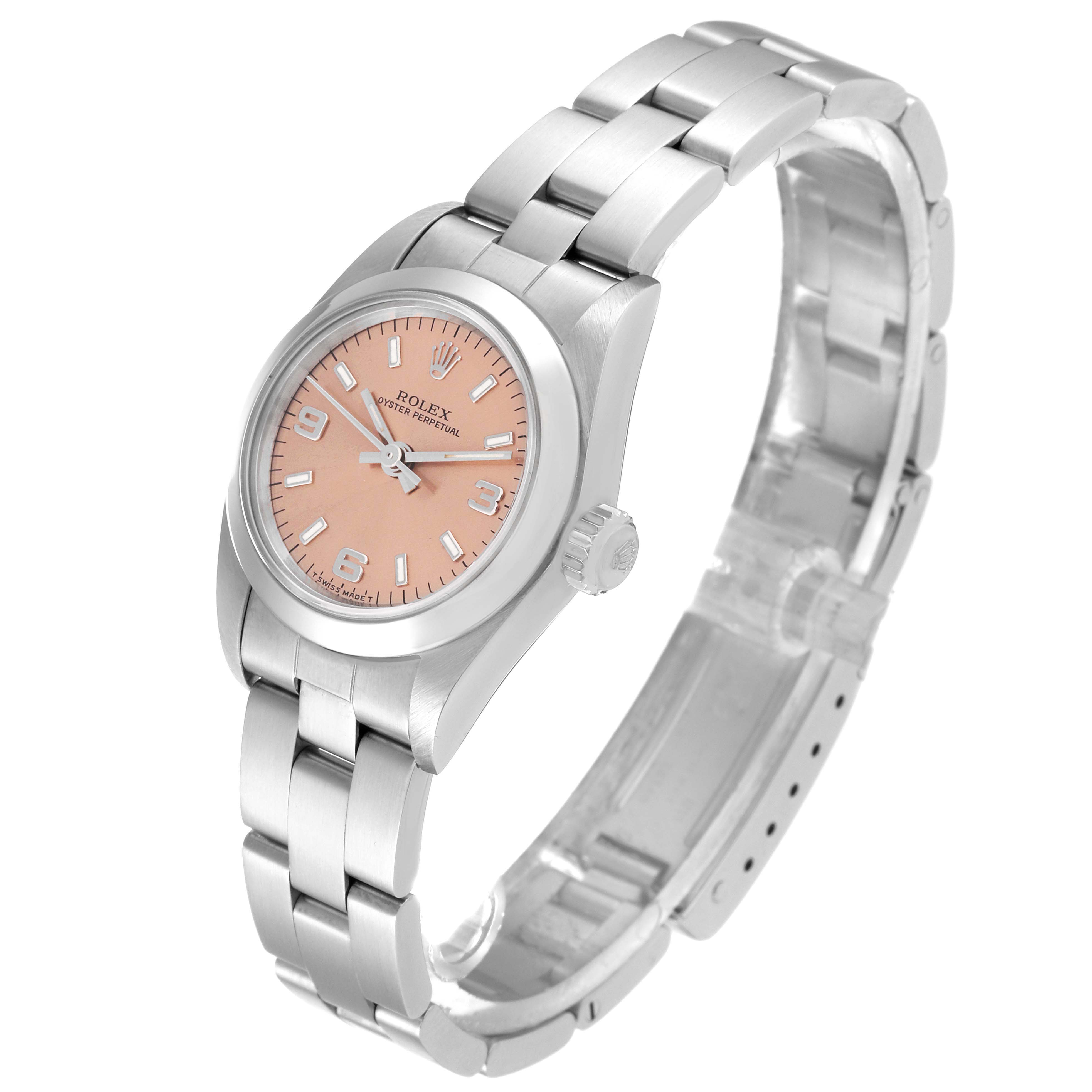 This image shows a Rolex Oyster Perpetual 67180 Women
s Stainless Steel Pink Dial 67180 Women
s Stainless Steel Pink Dial watch at a slight side angle, highlighting the dial, bracelet, and crown.