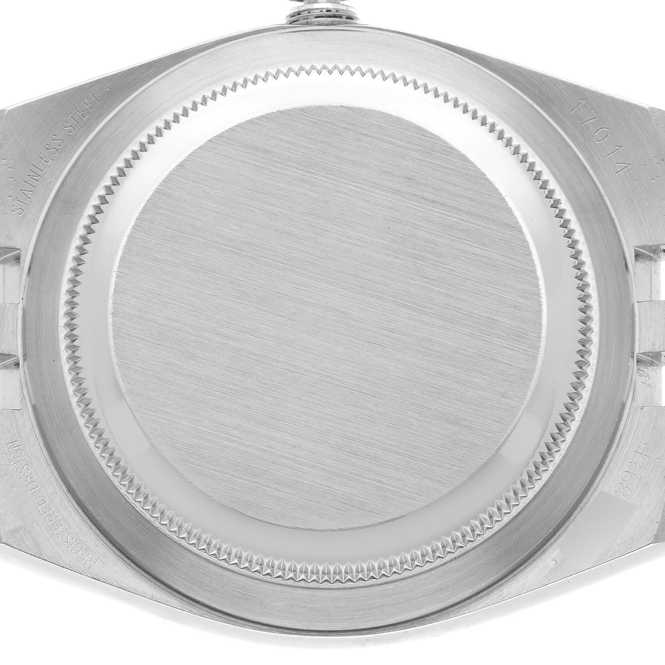This image shows the stainless steel case back of a Rolex Oysterquartz 17014 Men
s Stainless Steel Grey Dial 17014 Men
s Stainless Steel Grey Dial watch from a top-down angle.