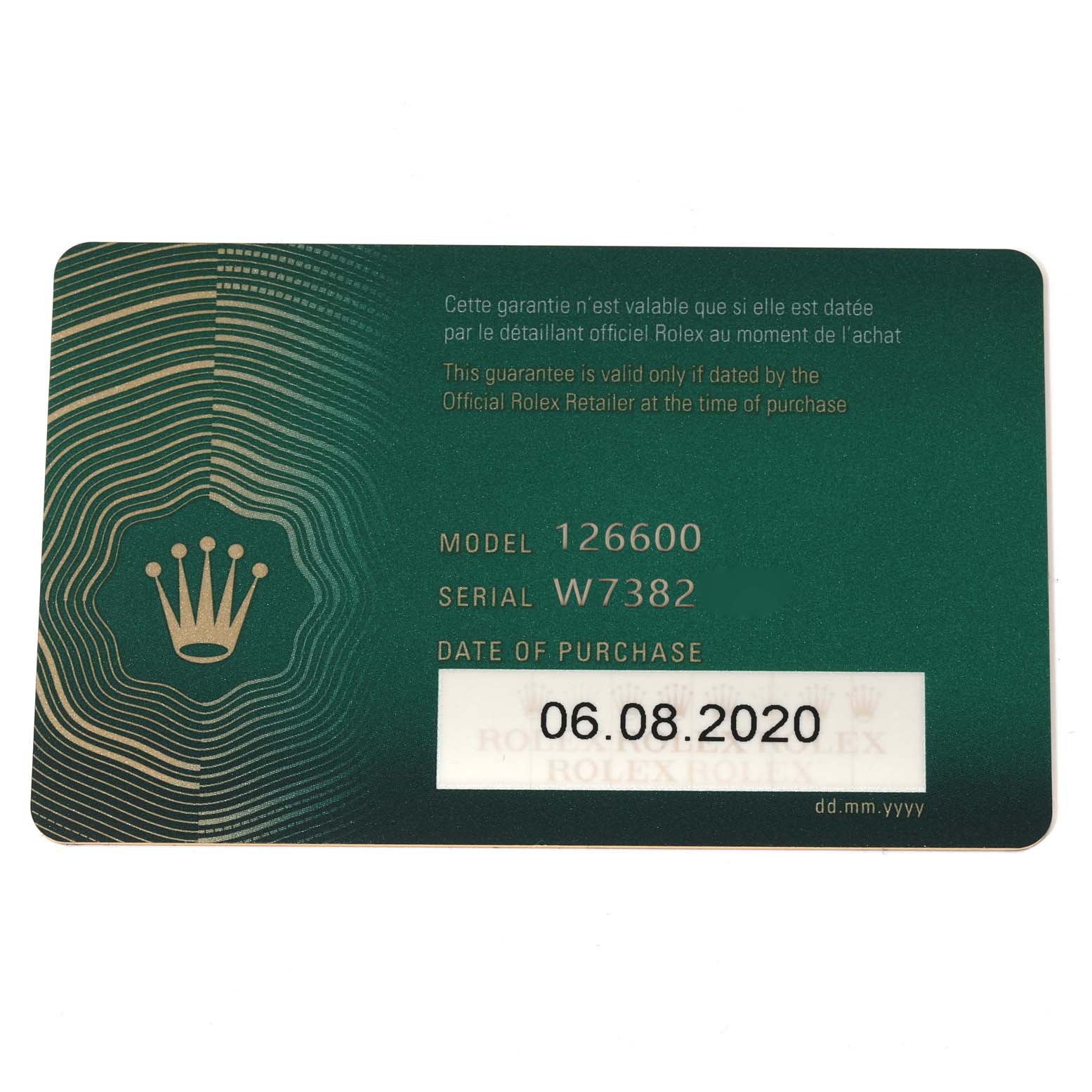 This image shows a warranty card for the Rolex Sea-Dweller 126600 Men
s Stainless Steel Black Dial 126600 Men
s Stainless Steel Black Dial model 126600, displaying the model number, serial number, and purchase date.