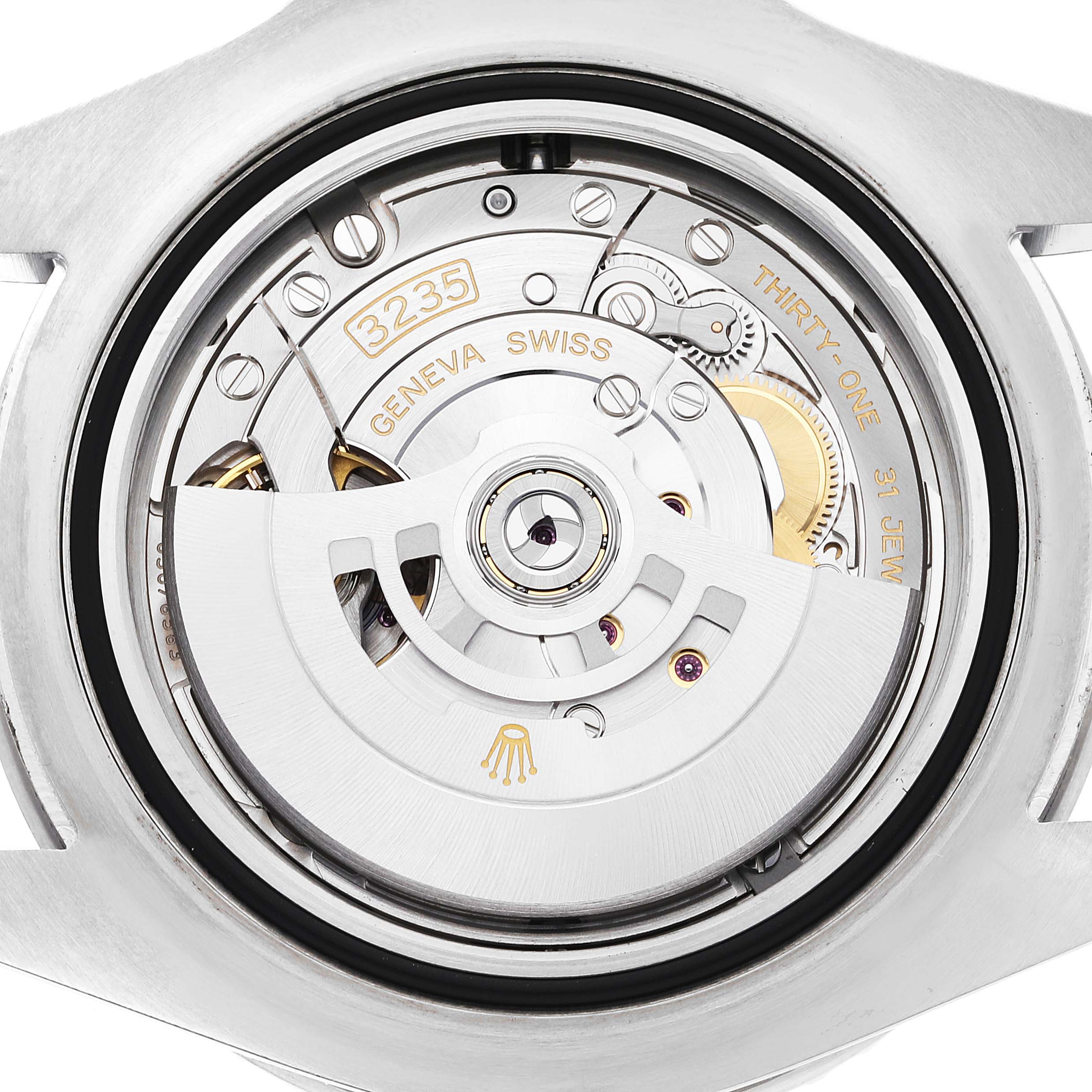 This image shows a close-up view of the movement of a Rolex Sea-Dweller 126600 Men
s Stainless Steel Black Dial 126600 Men
s Stainless Steel Black Dial watch, highlighting its internal mechanics.