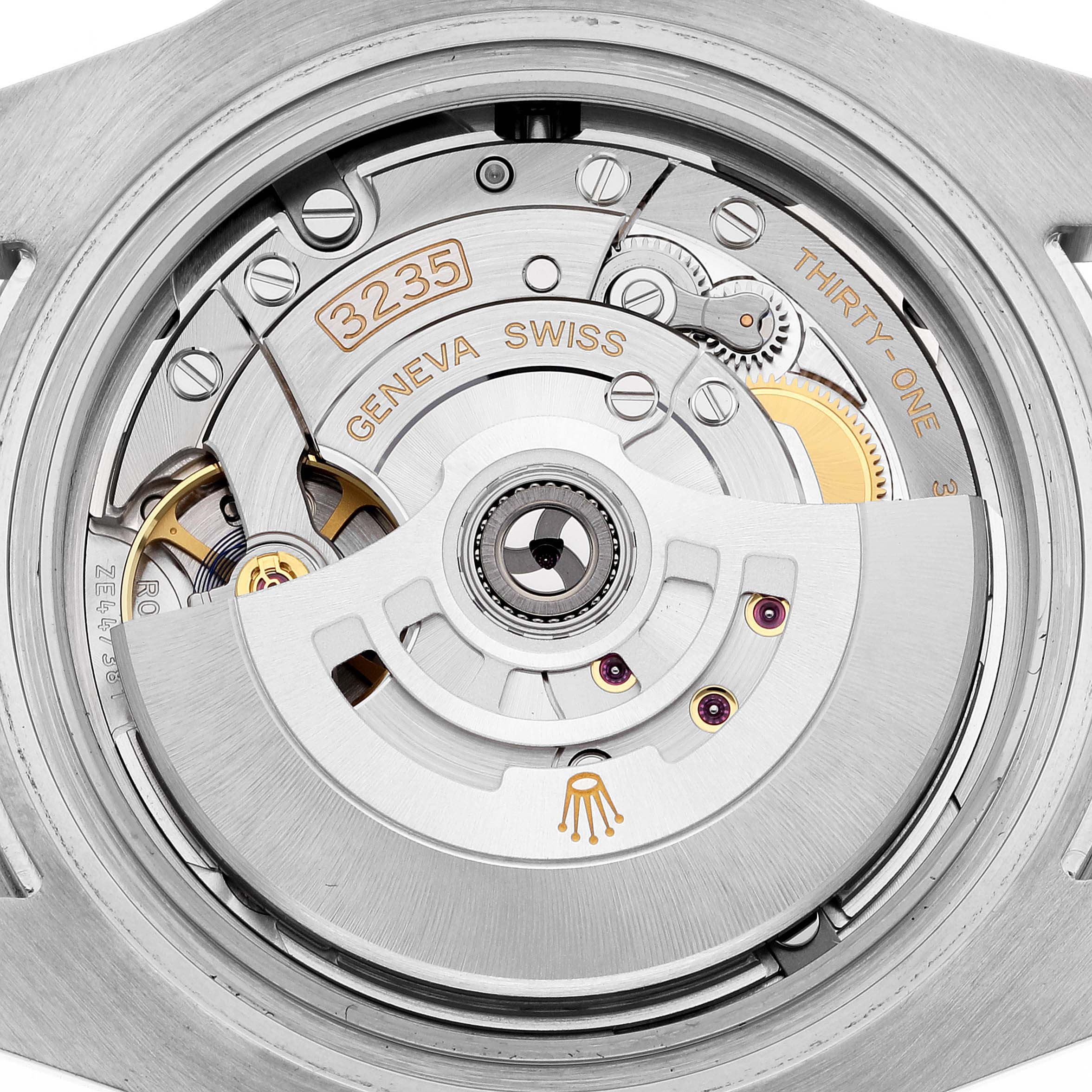 The image shows a close-up view of the movement mechanism of the Rolex Submariner 126613LB Men
s Steel and Gold (two tone) Blue Dial 126613LB Men
s Steel and Gold (two tone) Blue Dial.