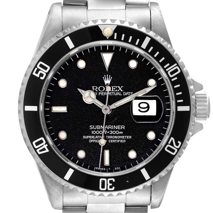 The image shows a front view of a Rolex Submariner watch, highlighting the dial, bezel, and part of the stainless steel bracelet.