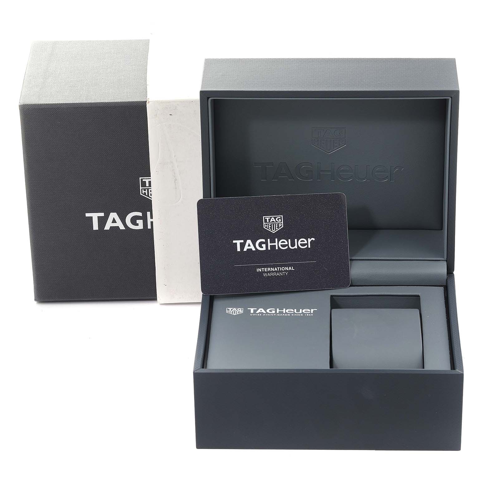 The image shows the packaging, watch box, and international warranty card of a Tag Heuer Carrera CBN2A10.BA0643 Men's Stainless Steel Green Dial CBN2A10.BA0643 Men's Stainless Steel Green Dial model watch.