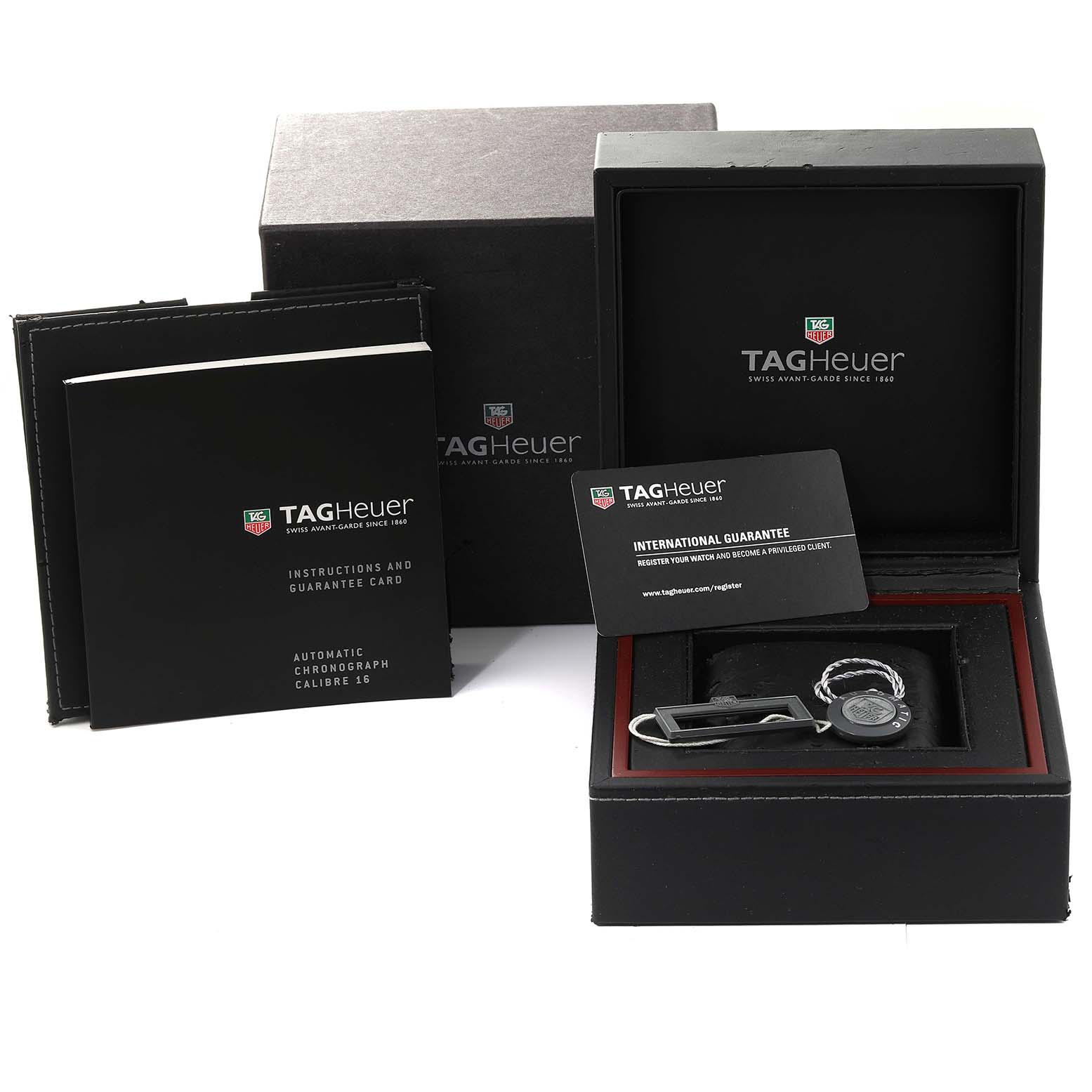 The image shows the packaging, instruction booklets, guarantee card, and accessory for the Tag Heuer Carrera CAS2111.BA0730 Men's Stainless Steel Silver Dial CAS2111.BA0730 Men's Stainless Steel Silver Dial model watch.