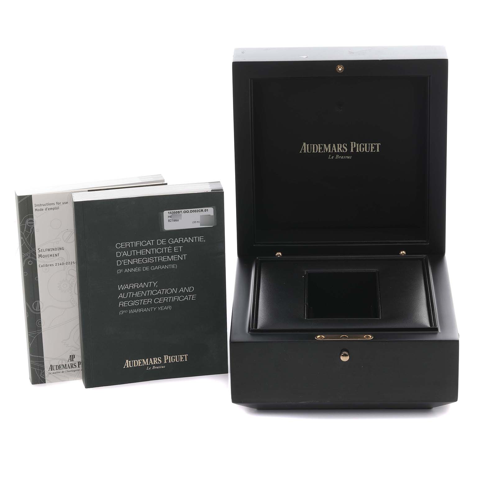 The image shows the open box and booklets for an Audemars Piguet Millenary 15350ST.OO.D002CR.01 Men's Stainless Steel Transparent Dial 15350ST.OO.D002CR.01 Men's Stainless Steel Transparent Dial watch.