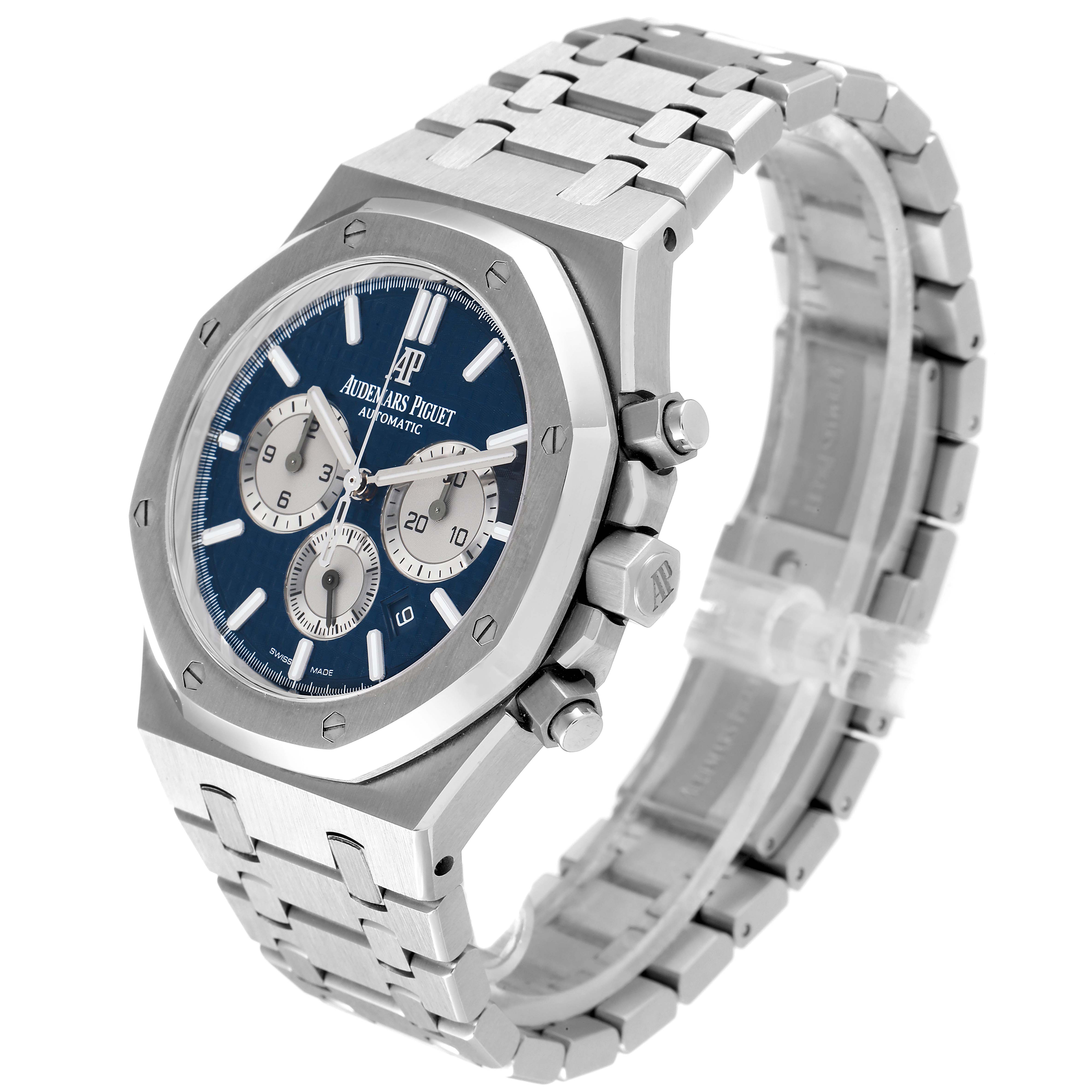 The image shows an angled view of the Royal Oak model by Audemars Piguet, highlighting the face, bezel, crown, and bracelet.
