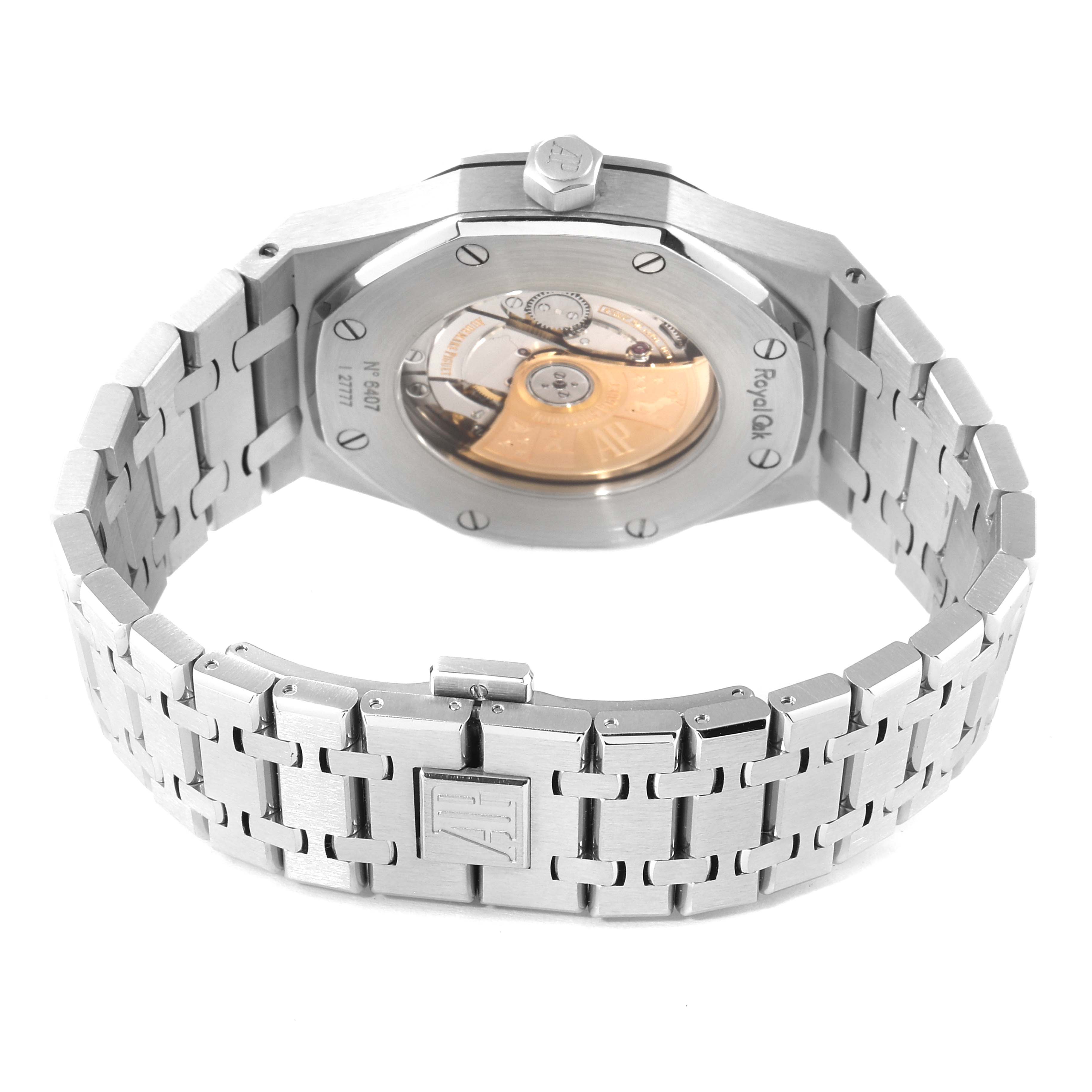 The image shows the back and part of the bracelet of an Audemars Piguet Royal Oak 15400ST.OO.1220ST.03 Men's Stainless Steel Blue Dial 15400ST.OO.1220ST.03 Men's Stainless Steel Blue Dial watch at a rear angle, highlighting its mechanical movement.