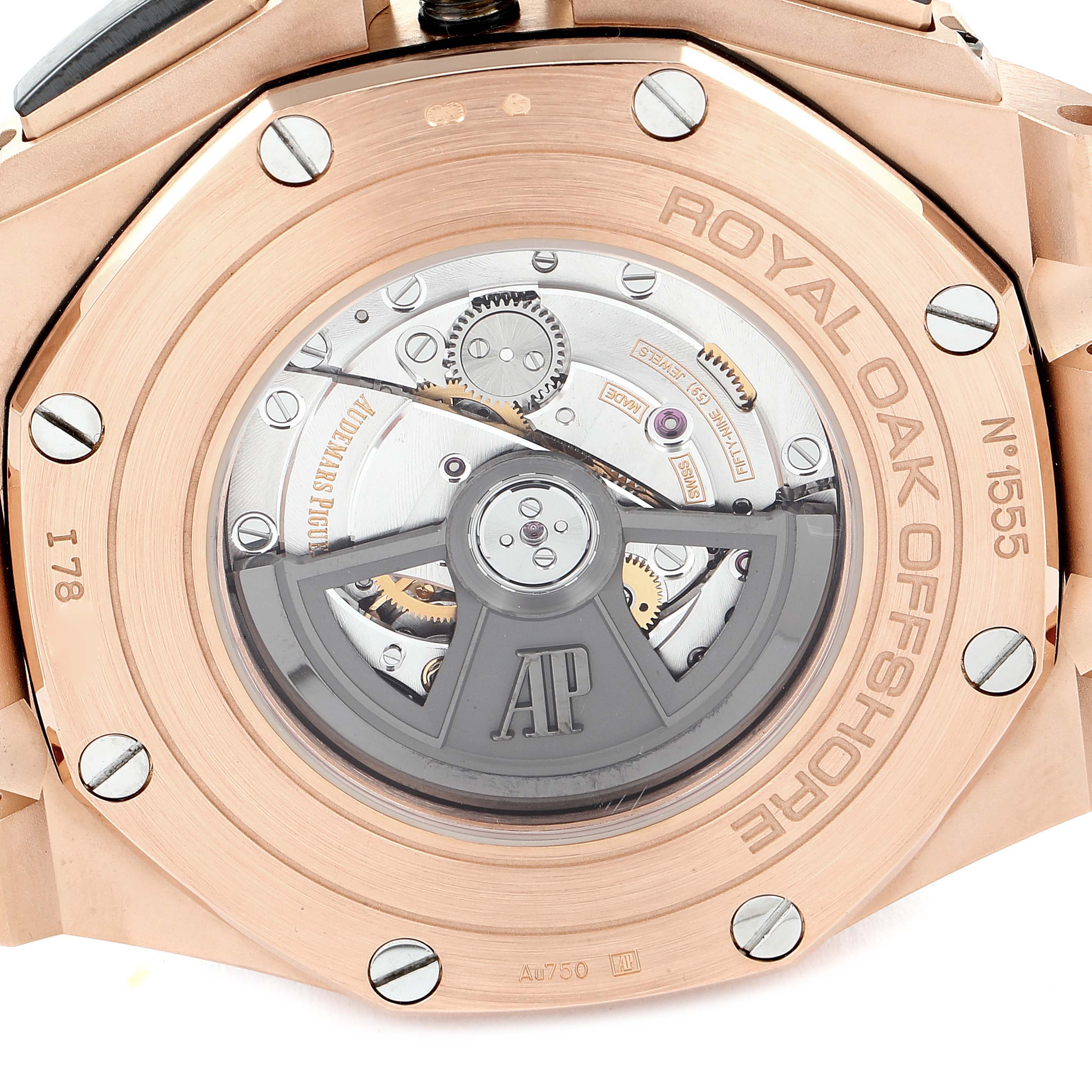 The image shows the back case and movement of the Audemars Piguet Royal Oak Offshore 26401RO.OO.A002.CA.01 Men's Rose Gold Black Dial 26401RO.OO.A002.CA.01 Men's Rose Gold Black Dial watch, highlighting its rotor and internal mechanics.