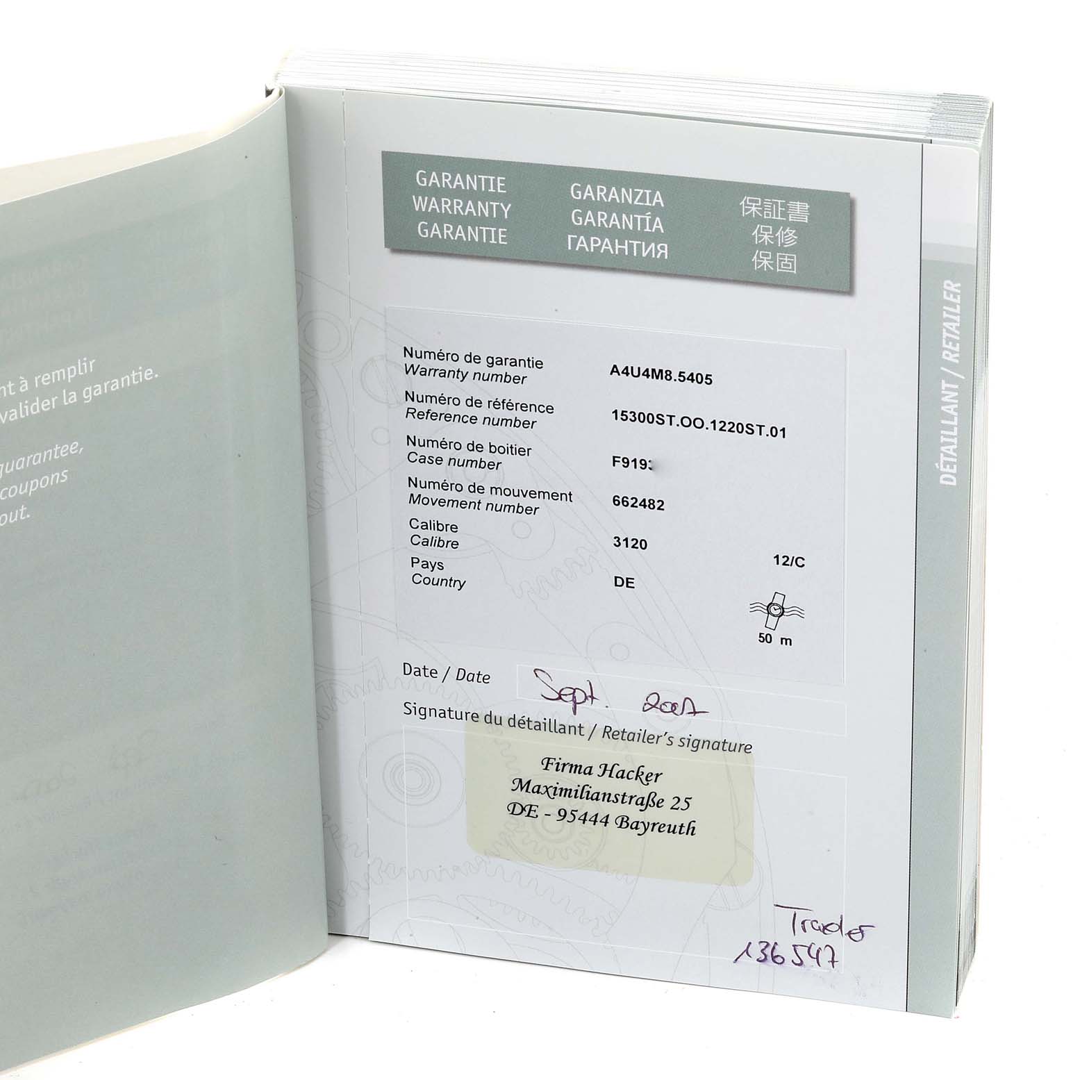 The image shows the warranty booklet for the Audemars Piguet Royal Oak 15300ST.00.1220ST.01 Men
s Stainless Steel White Dial 15300ST.00.1220ST.01 Men
s Stainless Steel White Dial watch, displaying warranty and reference details.