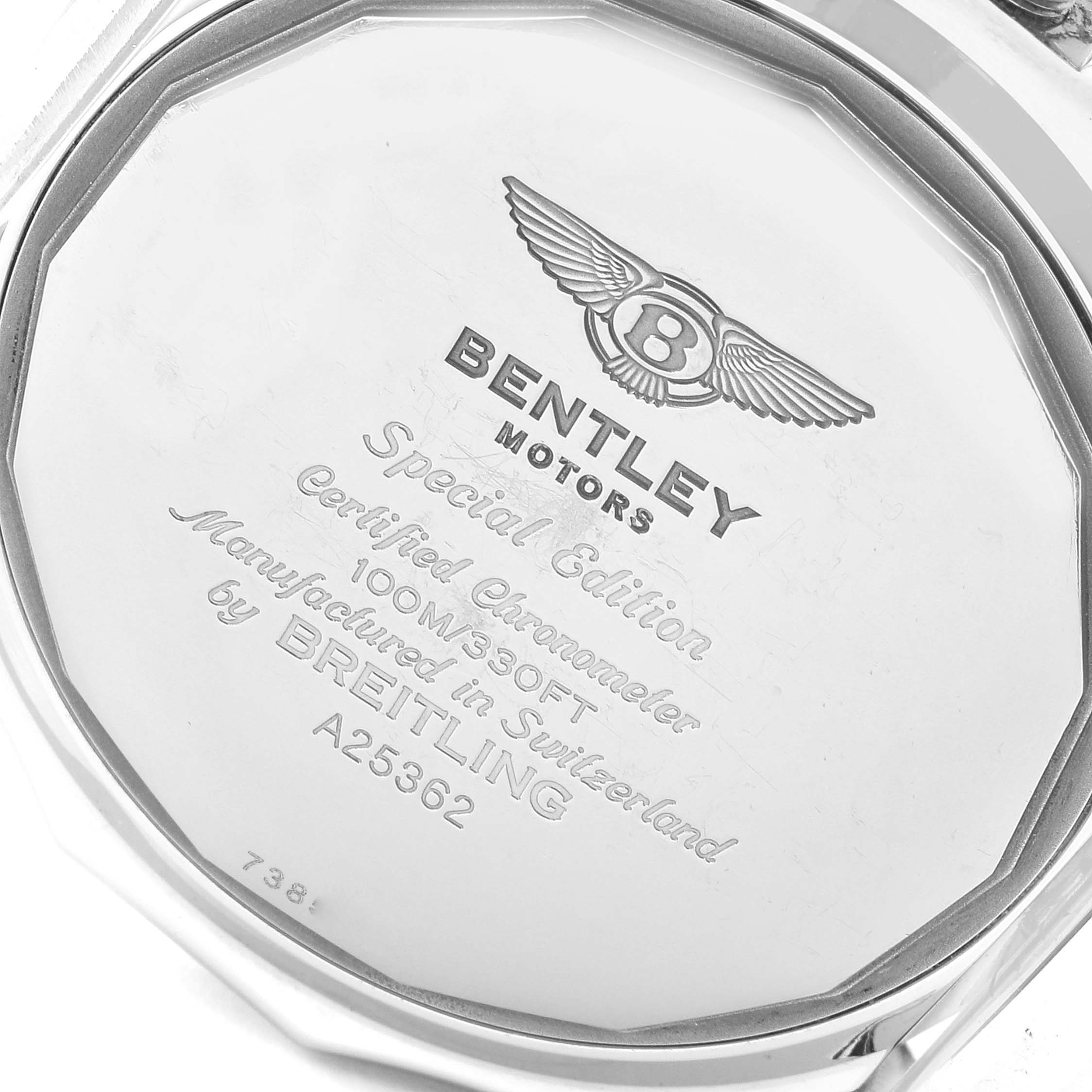 The image shows the back case of a Bentley model watch by Breitling, highlighting its engravings and logos.