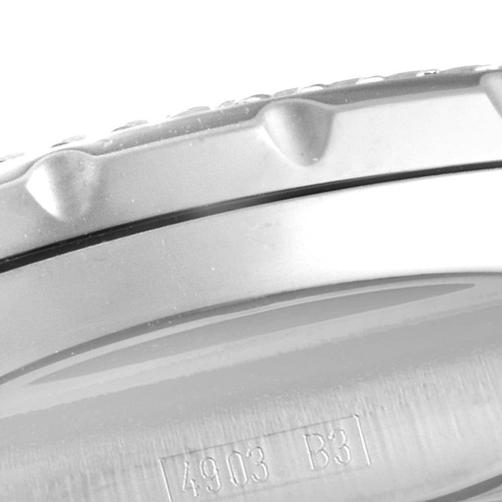 The image shows a close-up of the bezel and part of the case of a Bentley model by Breitling.