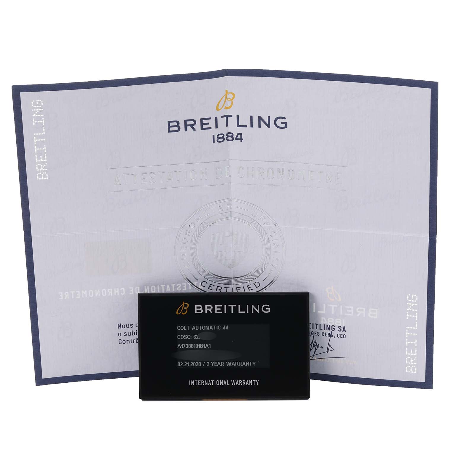 The image shows the warranty card and certificate for a Breitling Colt A17388101B1A1 Men's Stainless Steel Black Dial A17388101B1A1 Men's Stainless Steel Black Dial watch, captured from the front angle.