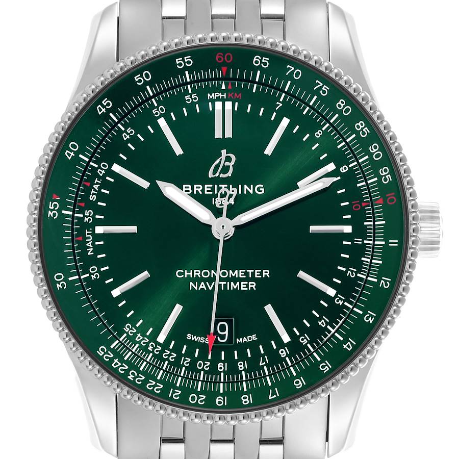 The Breitling Navitimer watch is shown from the front, featuring the green dial, bezel, hands, and a partial view of the bracelet.