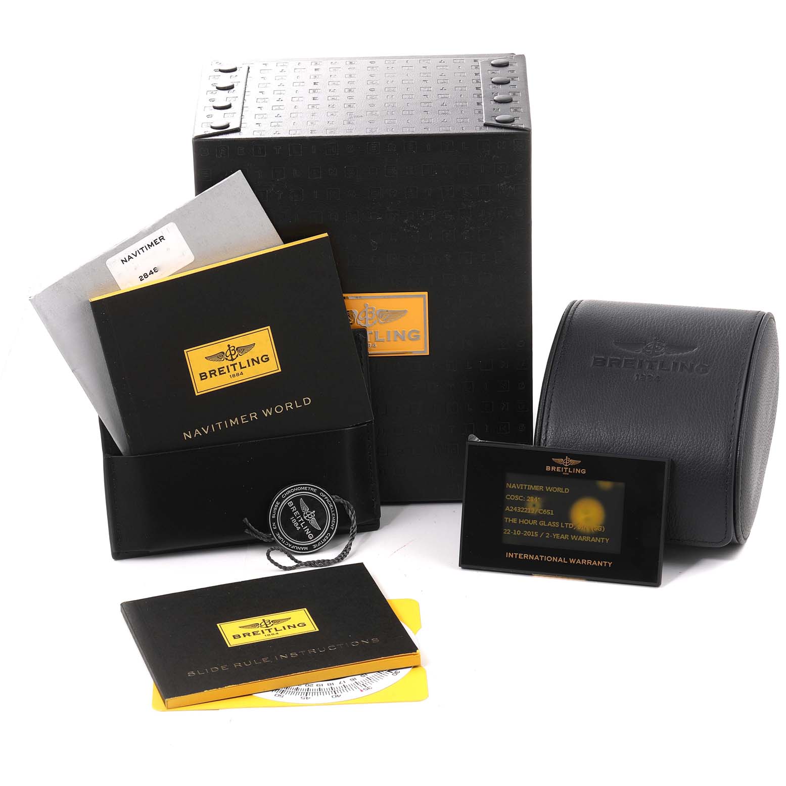 The image shows the packaging, warranty card, instruction manuals, and a travel case for the Breitling Navitimer A24322 Men
s Stainless Steel Blue Dial A24322 Men
s Stainless Steel Blue Dial watch.