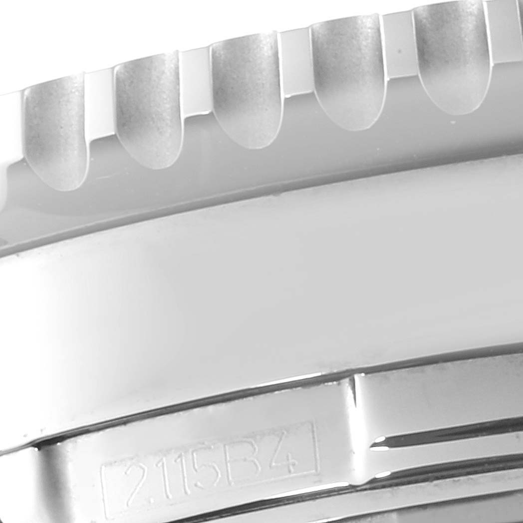 The image shows a close-up view of the bezel and part of the side case of a Breitling Navitimer A24322 Men
s Stainless Steel Blue Dial A24322 Men
s Stainless Steel Blue Dial watch, focusing on the edge details.