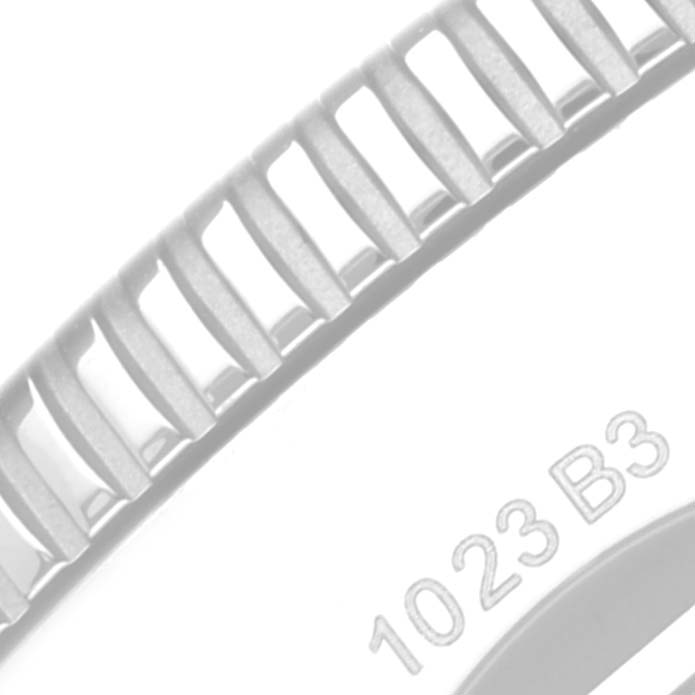 This image shows a close-up of the bezel and part of the case back of a Breitling Superocean A13313 Men's Stainless Steel Green Dial A13313 Men's Stainless Steel Green Dial watch with model number 1023 B3.