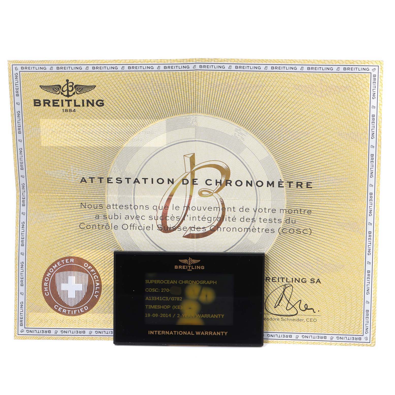 The image shows a Breitling Superocean A13341 Men's Stainless Steel White Dial A13341 Men's Stainless Steel White Dial Chronograph certificate and an international warranty card.