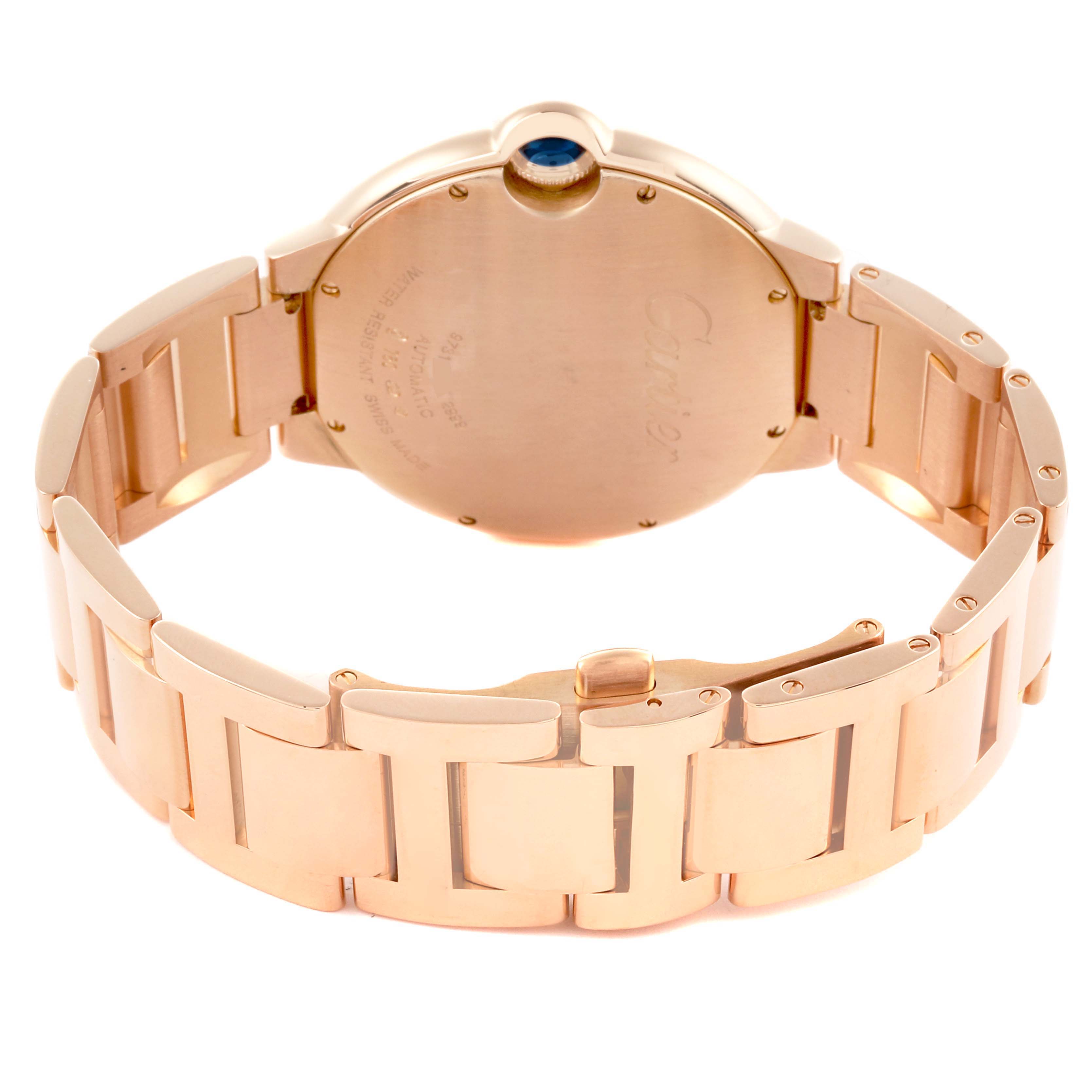 The Ballon Bleu by Cartier is shown from the back, highlighting the case back, crown, and bracelet in gold.