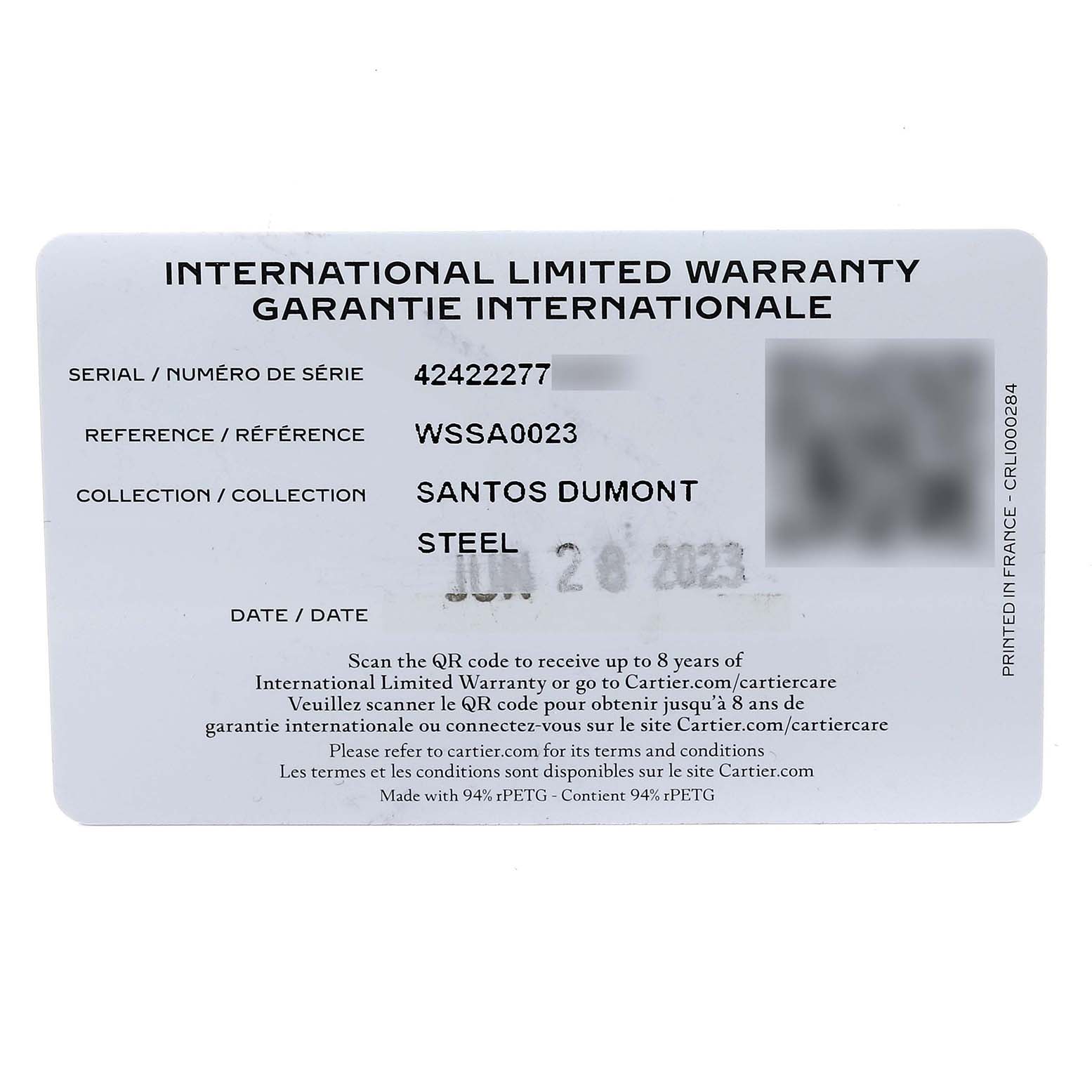 The image shows an international limited warranty card for the Cartier Santos WSSA0023 Women's Stainless Steel Silver Dial WSSA0023 Women's Stainless Steel Silver Dial Dumont watch model WSSA0023.