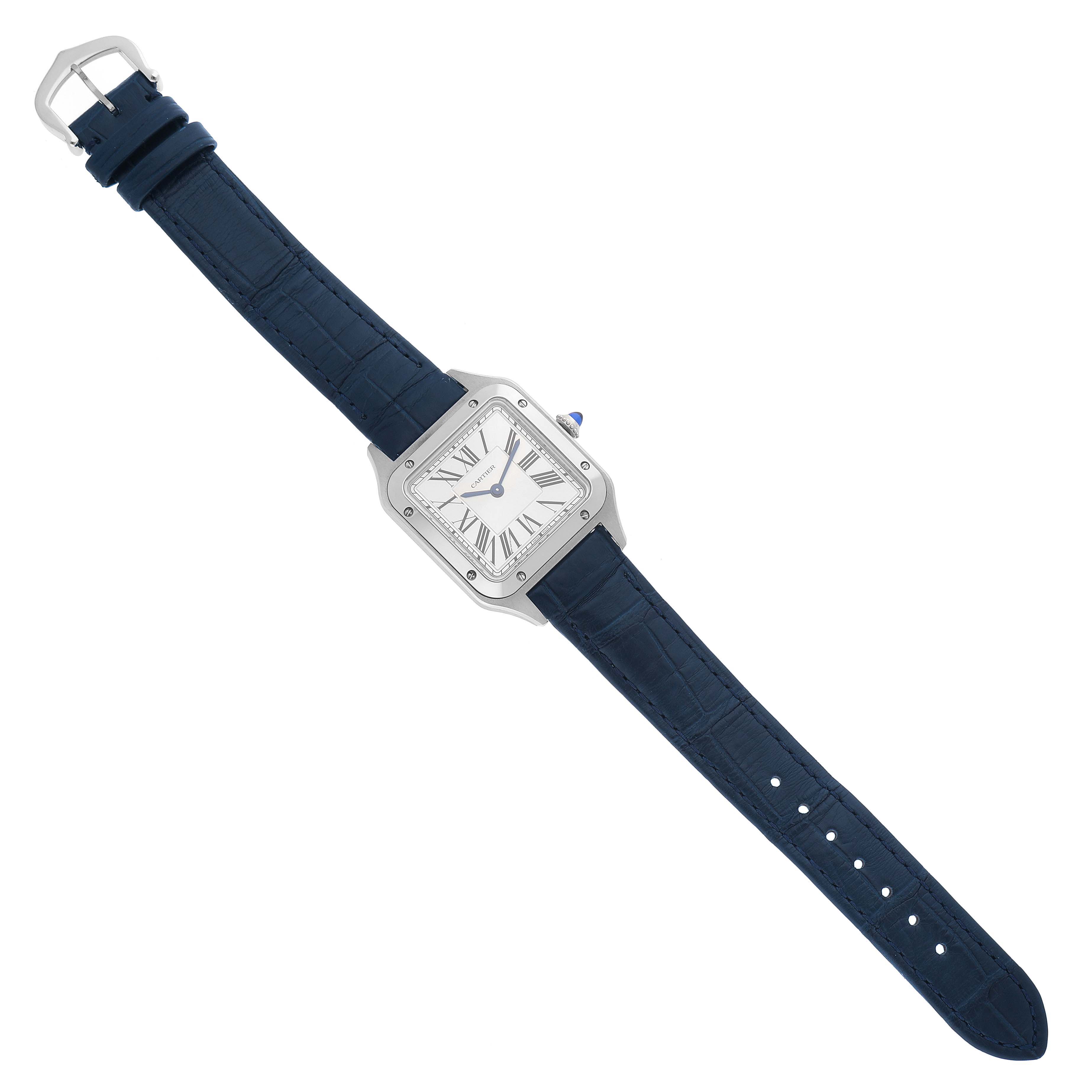 The Cartier Santos WSSA0023 Women's Stainless Steel Silver Dial WSSA0023 Women's Stainless Steel Silver Dial watch is shown from a top-down angle, displaying the face, case, and entire strap.