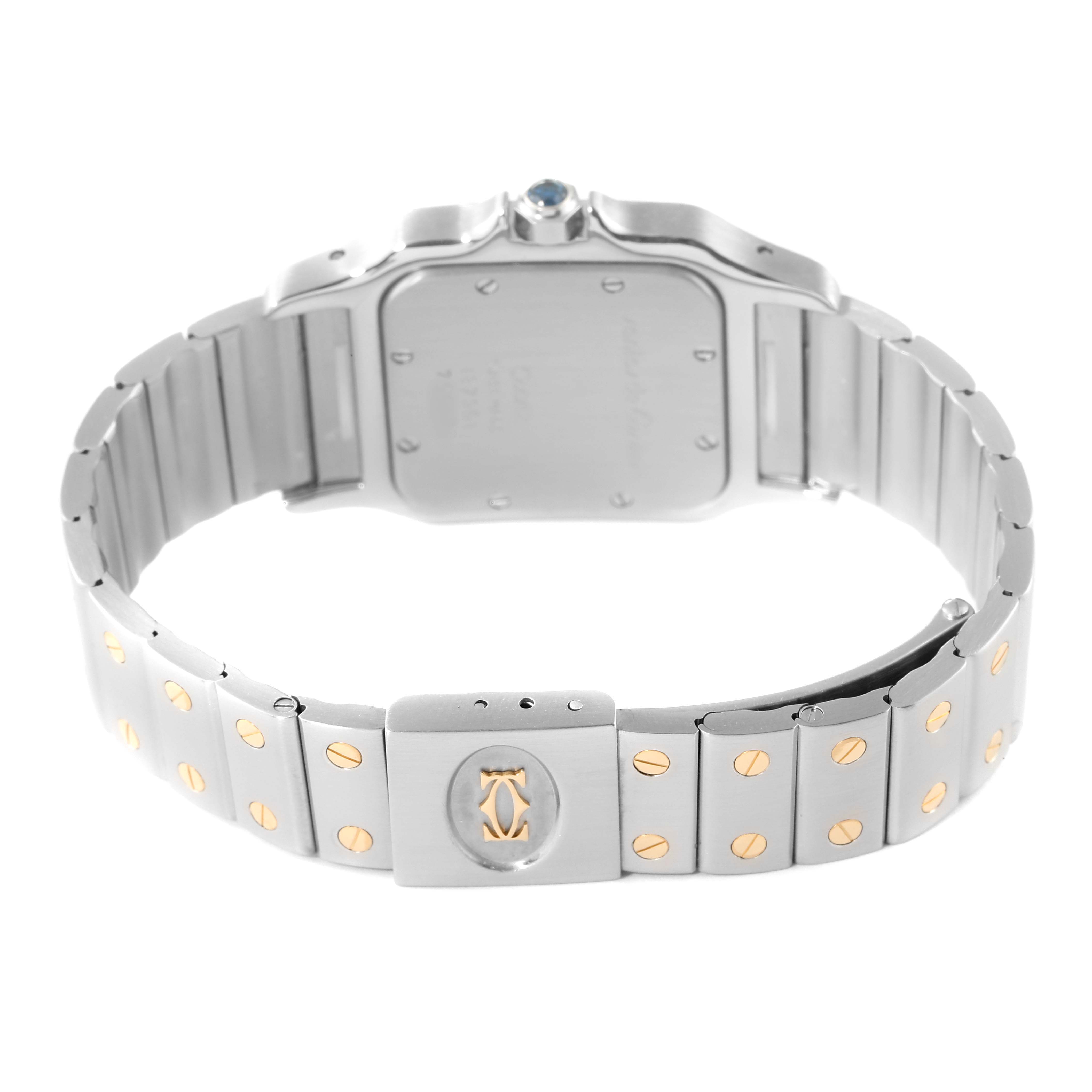 The image shows the back side of a Cartier Santos 187901 Men
s Steel and Gold (two tone) Silver Dial 187901 Men
s Steel and Gold (two tone) Silver Dial watch, highlighting its case and metal bracelet with gold screw accents.