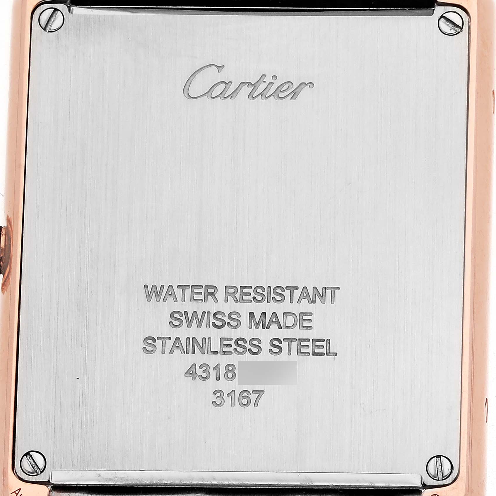 The image shows the back of a Cartier Tank Solo W5200025 Men
s Steel and Gold (two tone) Silver Dial W5200025 Men
s Steel and Gold (two tone) Silver Dial watch, highlighting the brand engraving and specifications.