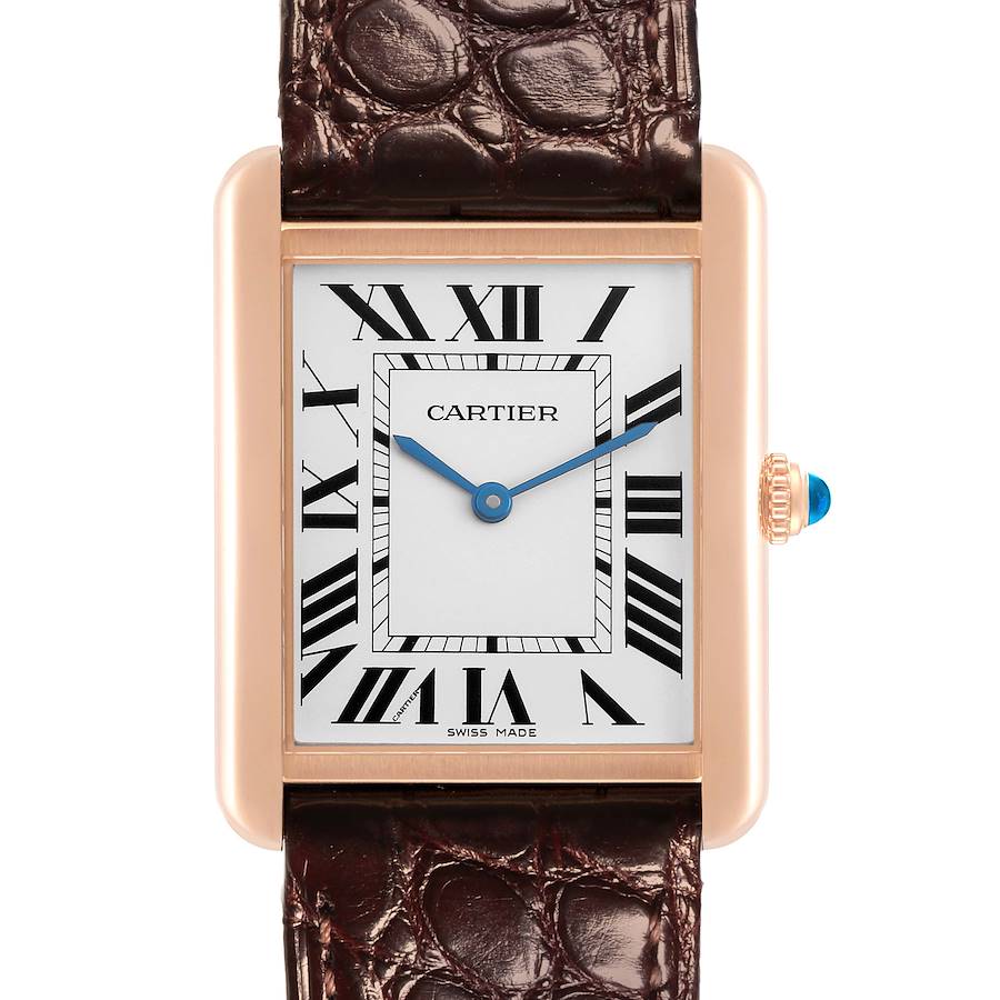 The Cartier Tank Solo watch is shown from a frontal angle, highlighting the dial, Roman numerals, blue steel hands, crown, and leather strap.