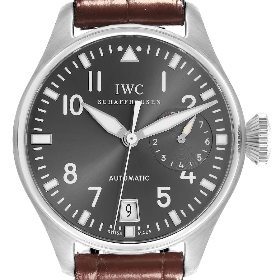 The IWC Pilot watch is shown from the front, featuring its dial, hands, crown, and part of the leather strap.