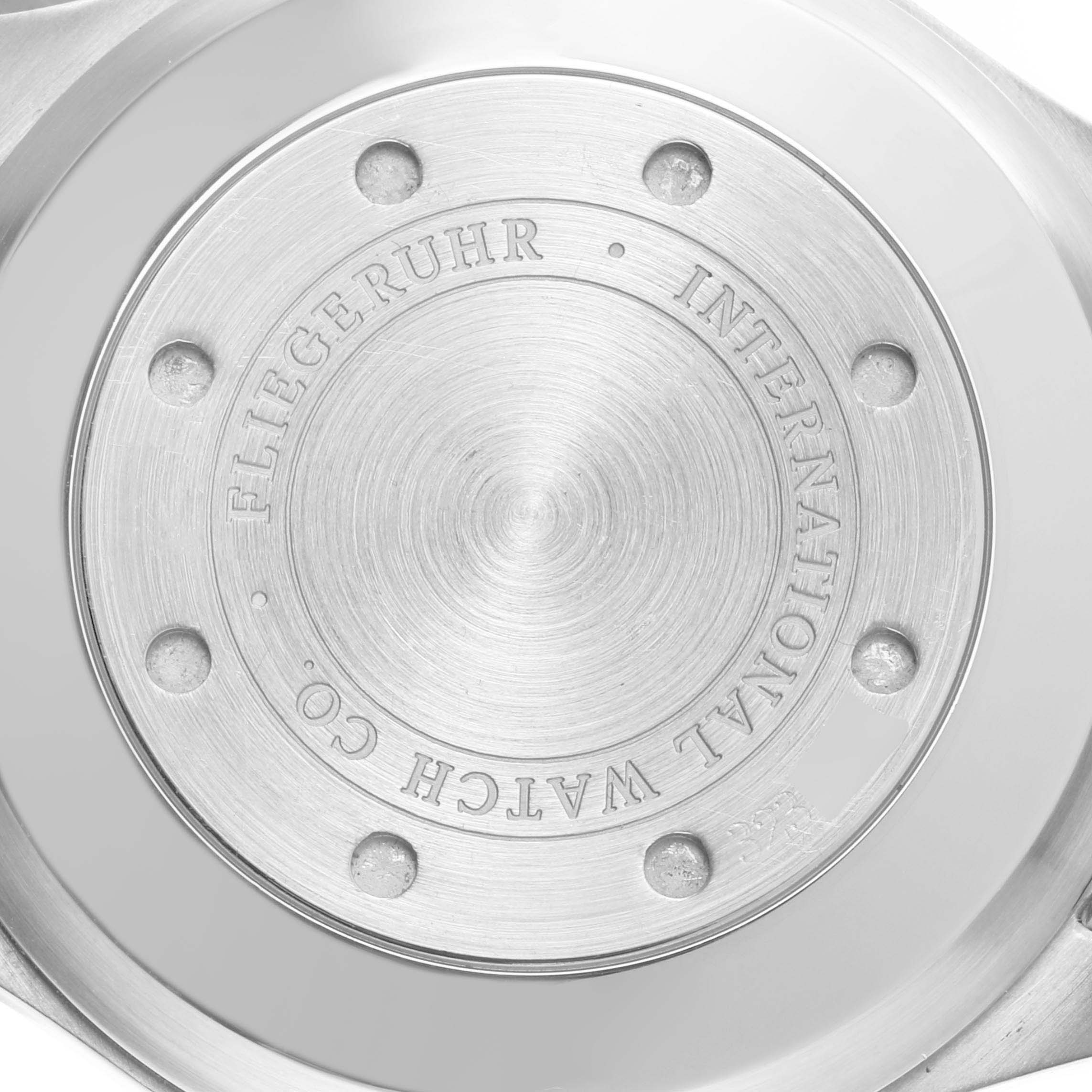 The image shows the back case of the IWC Pilot IW500402 Men's White Gold Grey Dial IW500402 Men's White Gold Grey Dial watch, featuring engraved branding details.