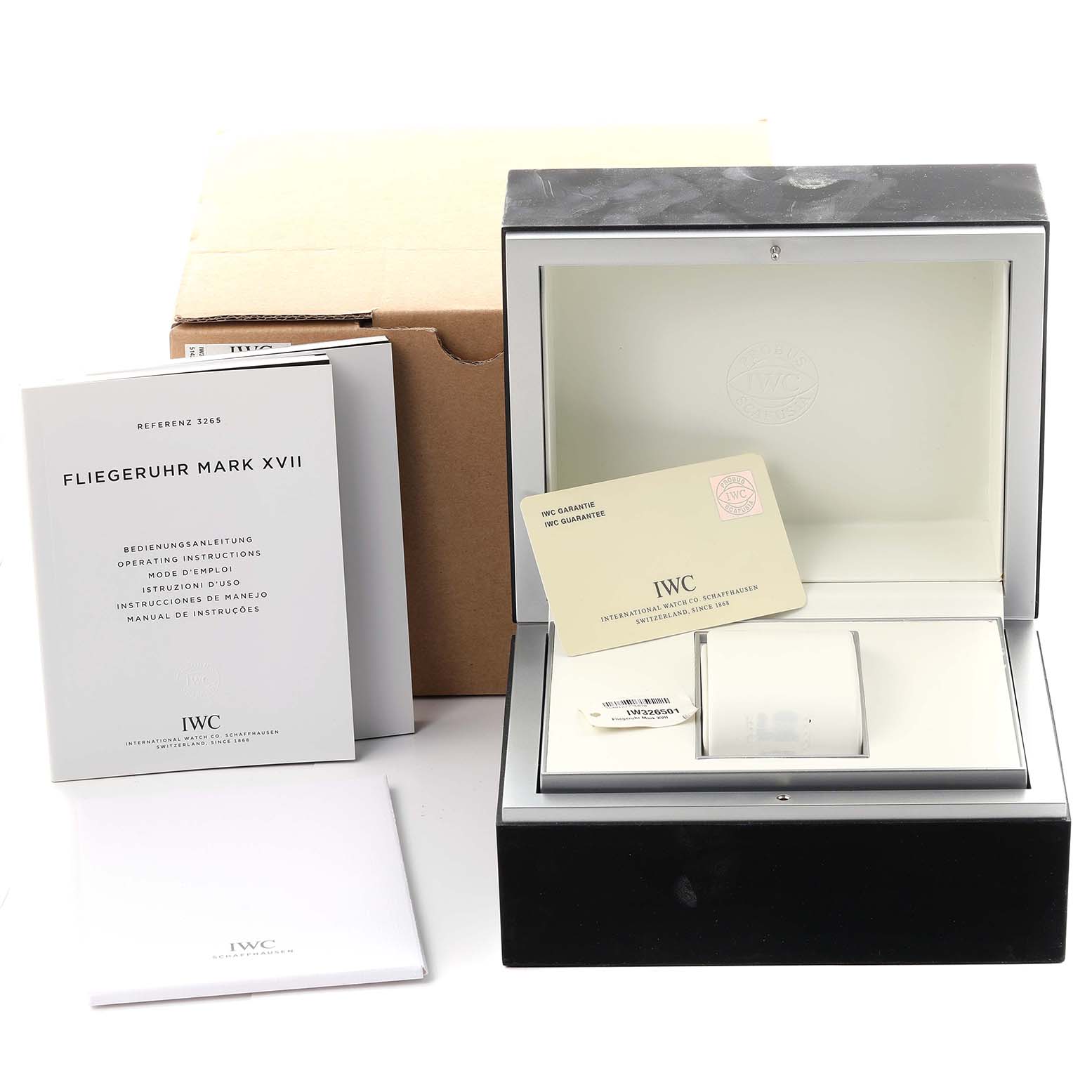 The image shows the packaging and documents, including a box and a warranty card, for the IWC Pilot IW326501 Men's Stainless Steel Black Dial IW326501 Men's Stainless Steel Black Dial model watch.
