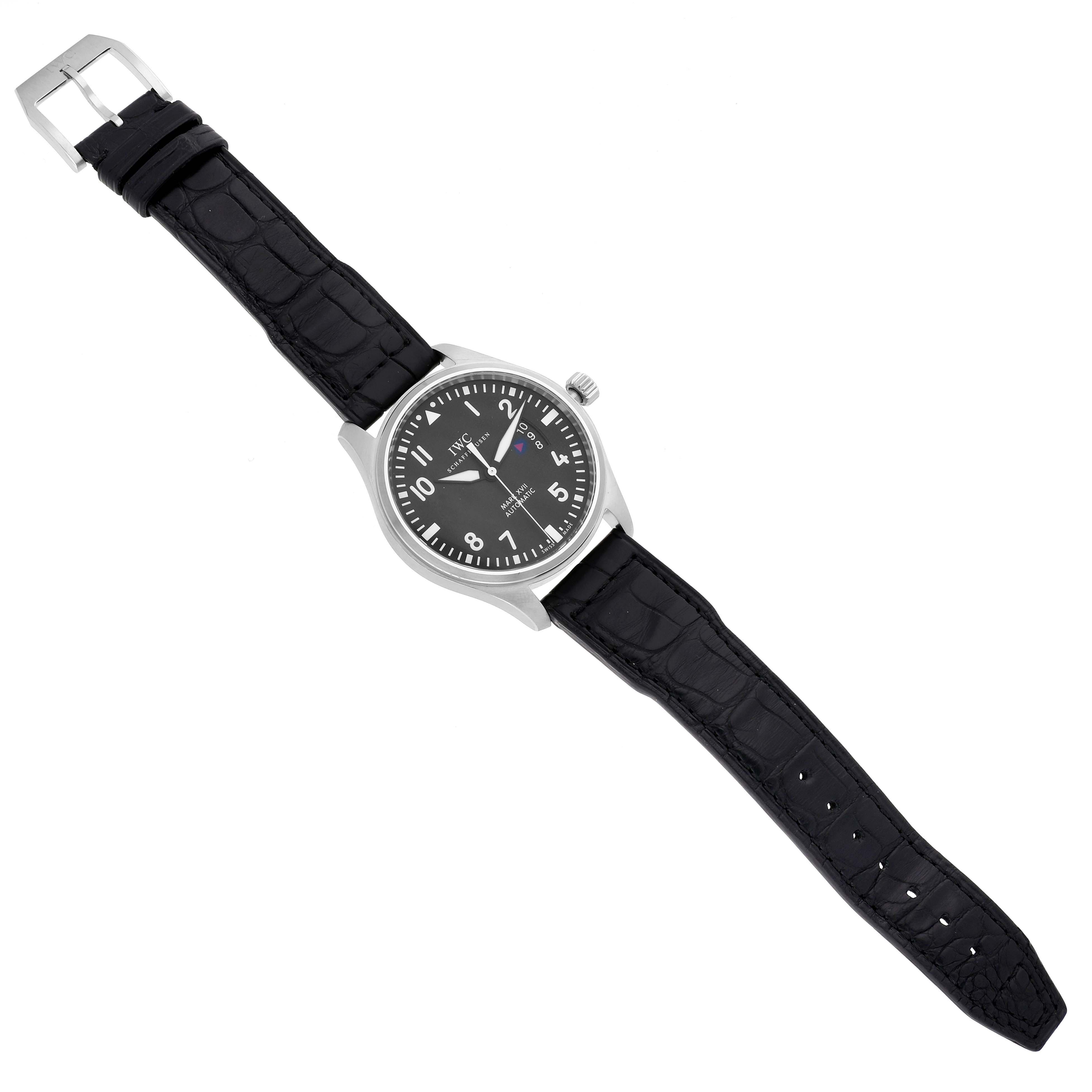 The IWC Pilot IW326501 Men's Stainless Steel Black Dial IW326501 Men's Stainless Steel Black Dial watch is shown from a top-down angle, displaying the black dial, case, strap, and buckle.
