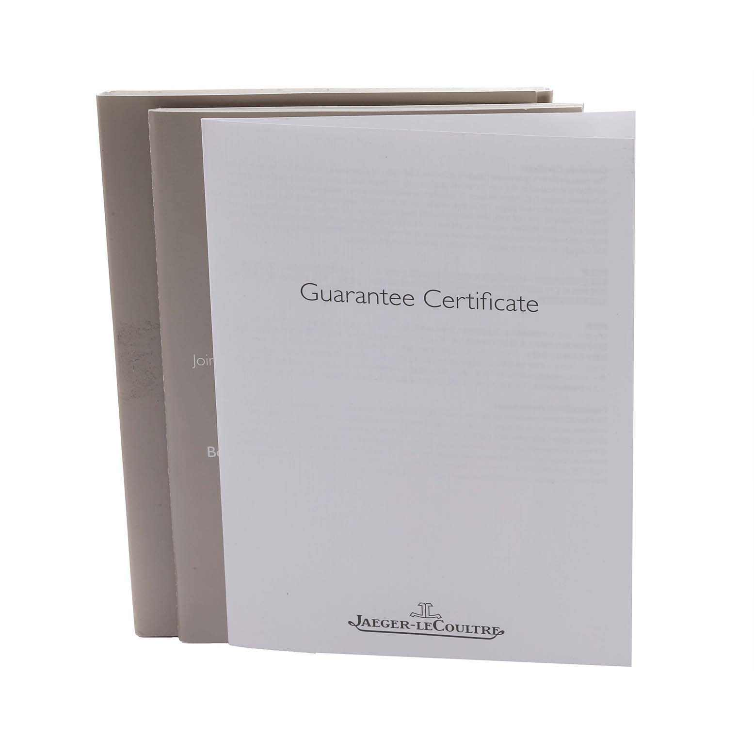 This image shows the Guarantee Certificate and accompanying booklets for the Reverso model by Jaeger LeCoultre, stacked upright.