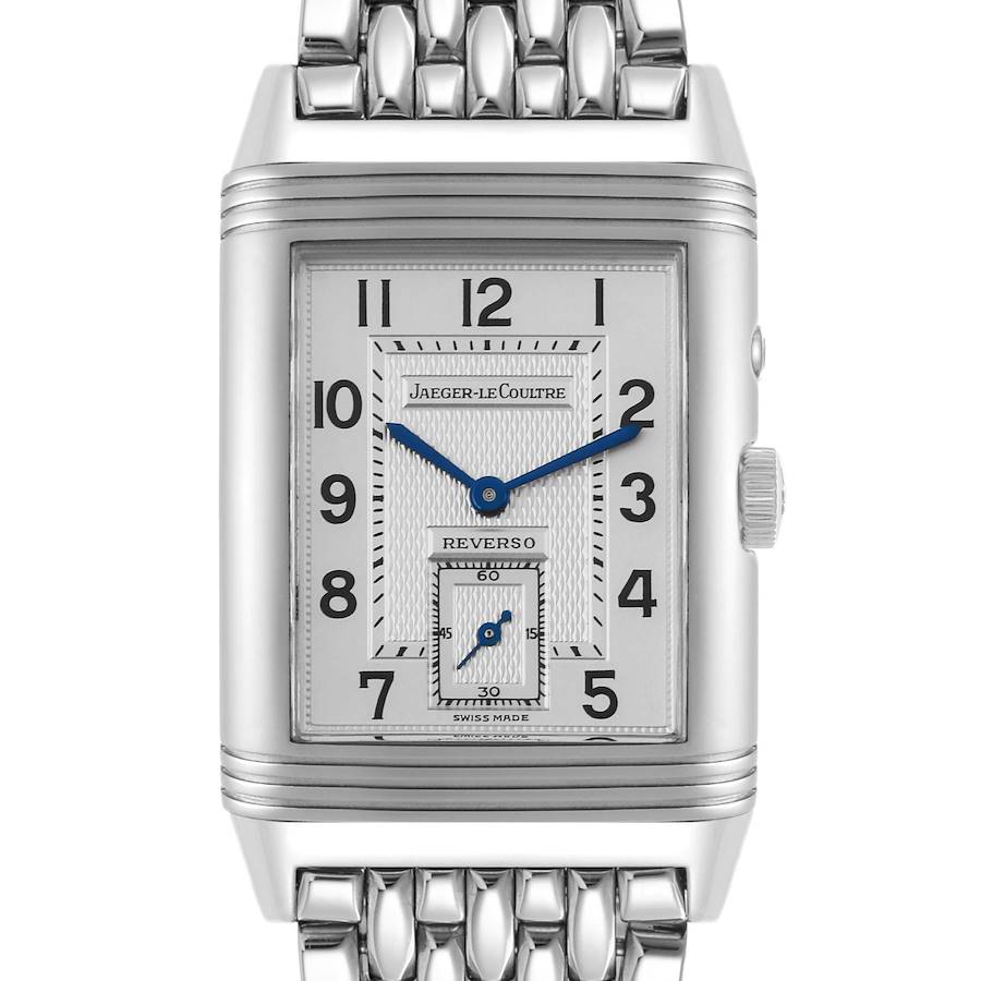 The image shows a frontal view of the Jaeger-LeCoultre Reverso watch, highlighting the dial, case, and silver bracelet.