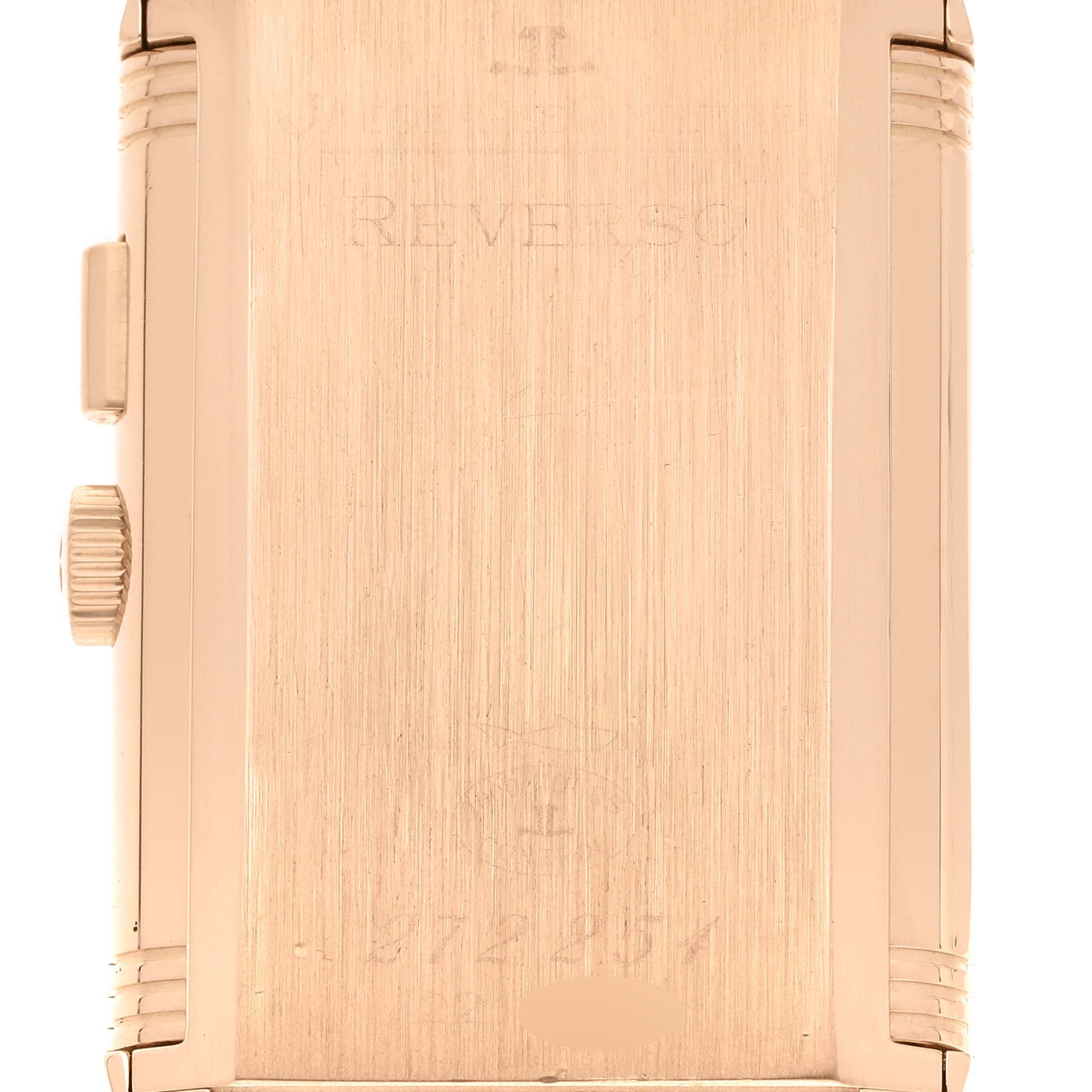 This image shows the back case of a Jaeger-LeCoultre Reverso watch from a close-up, vertical angle.