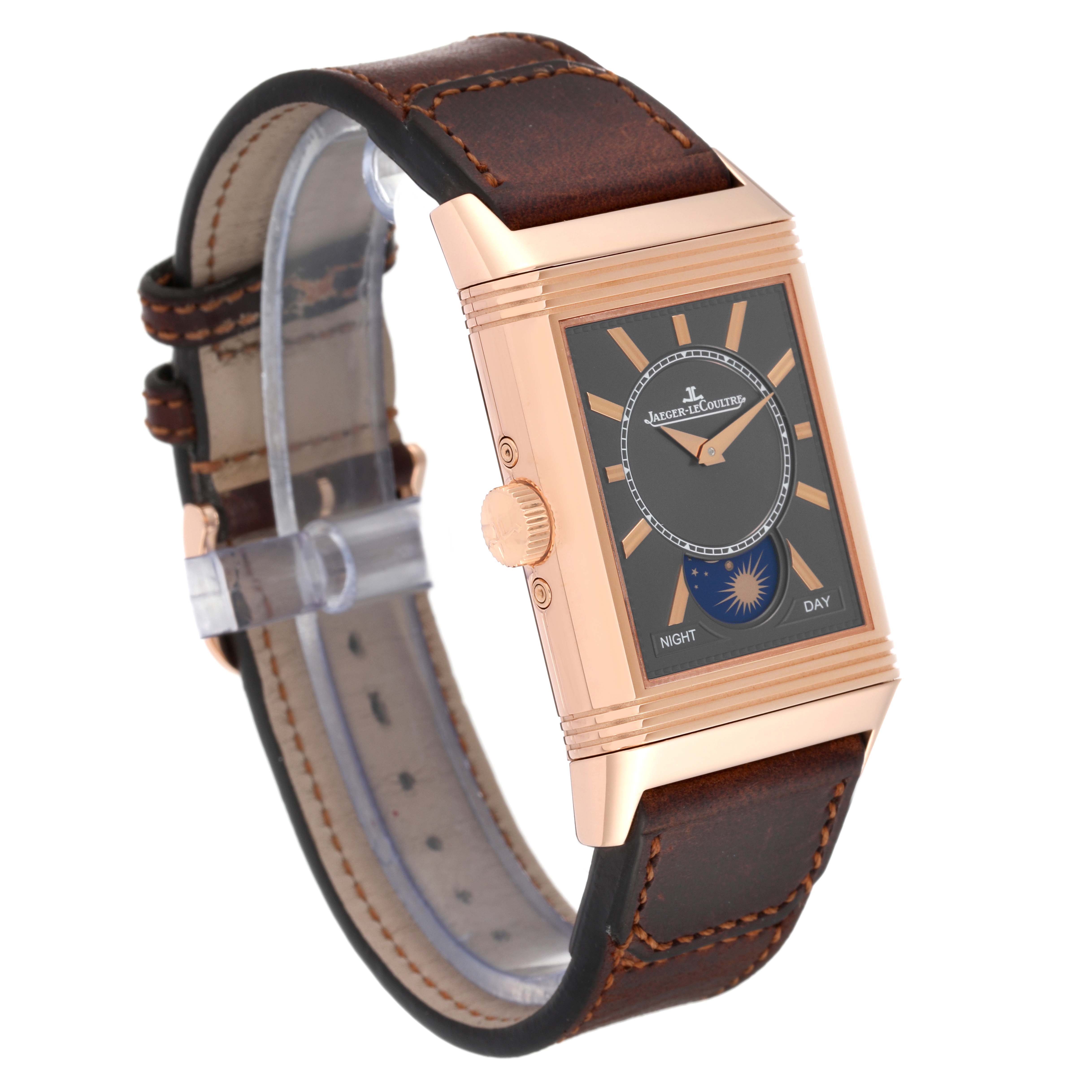 The image shows a Jaeger LeCoultre Reverso Q3912530 Men's Rose Gold Silver Dial Q3912530 Men's Rose Gold Silver Dial watch from a front angle, highlighting its rectangular face, crown, and leather strap.