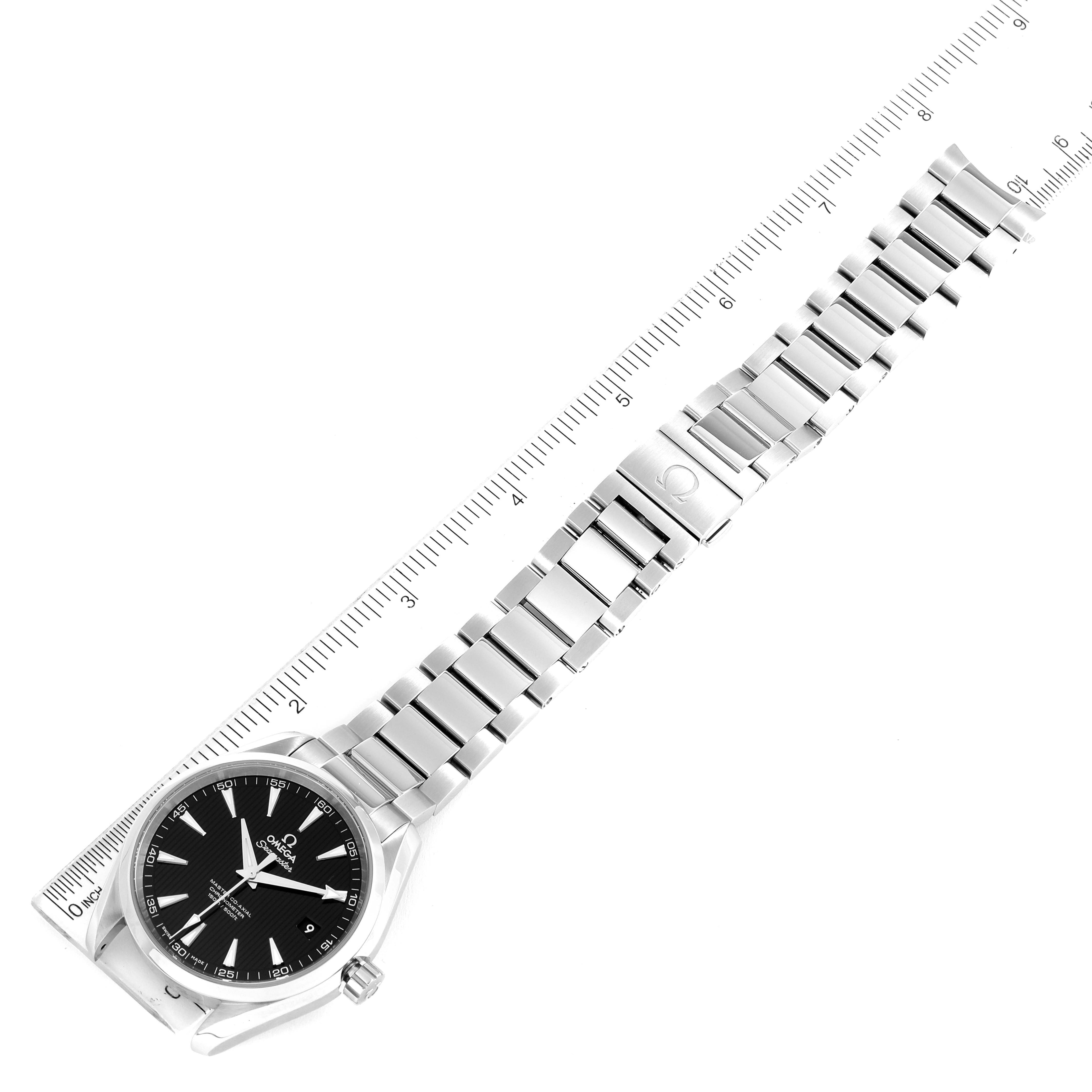 The image shows an Omega Aqua Terra 231.10.42.21.01.003 Men's Stainless Steel Black Dial 231.10.42.21.01.003 Men's Stainless Steel Black Dial watch laid flat with the case, dial, bracelet, and clasp visible next to a ruler.