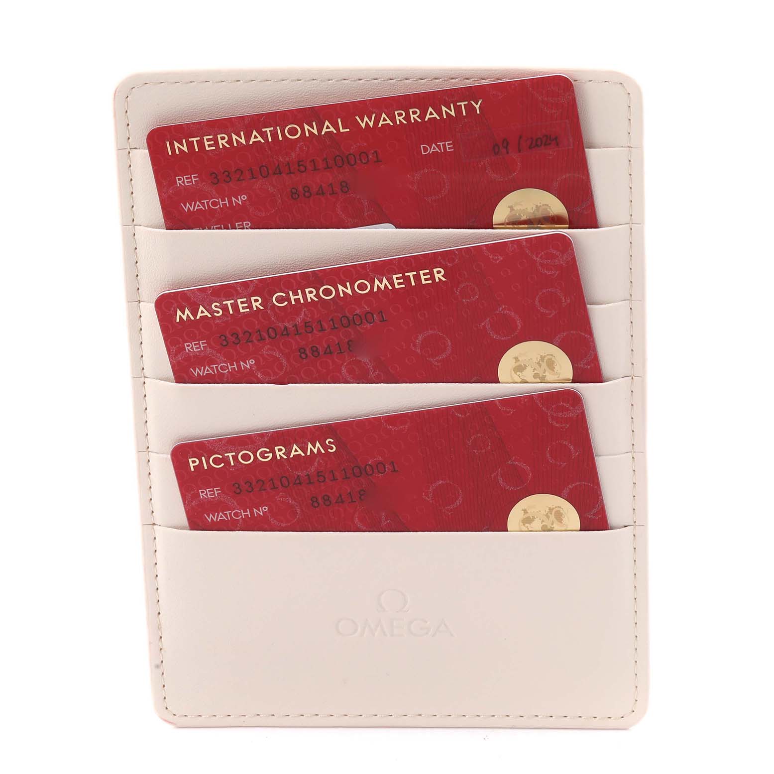 The image shows Omega Speedmaster 332.10.41.51.01.001 Men's Stainless Steel Green Dial 332.10.41.51.01.001 Men's Stainless Steel Green Dial watch accessories, including warranty cards in a leather holder.