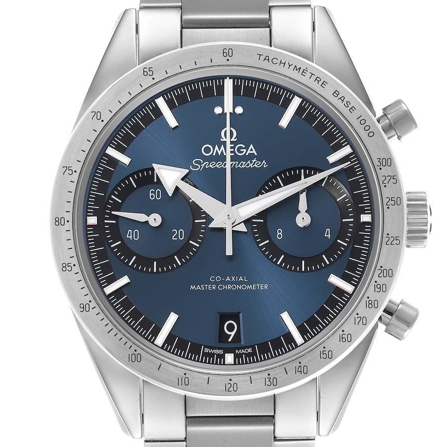 The Omega Speedmaster is shown from the front, featuring the dial, hands, subdials, and tachymetric bezel.