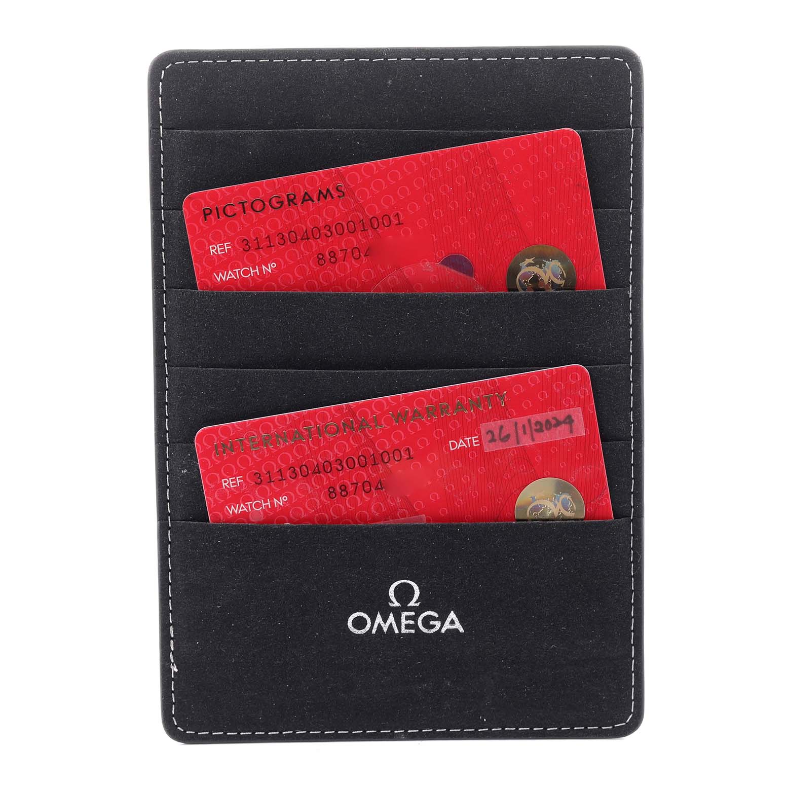 This image shows Omega Speedmaster 311.30.40.30.01.001 Men
s Stainless Steel Black Dial 311.30.40.30.01.001 Men
s Stainless Steel Black Dial watch warranty and pictogram cards in a branded holder.