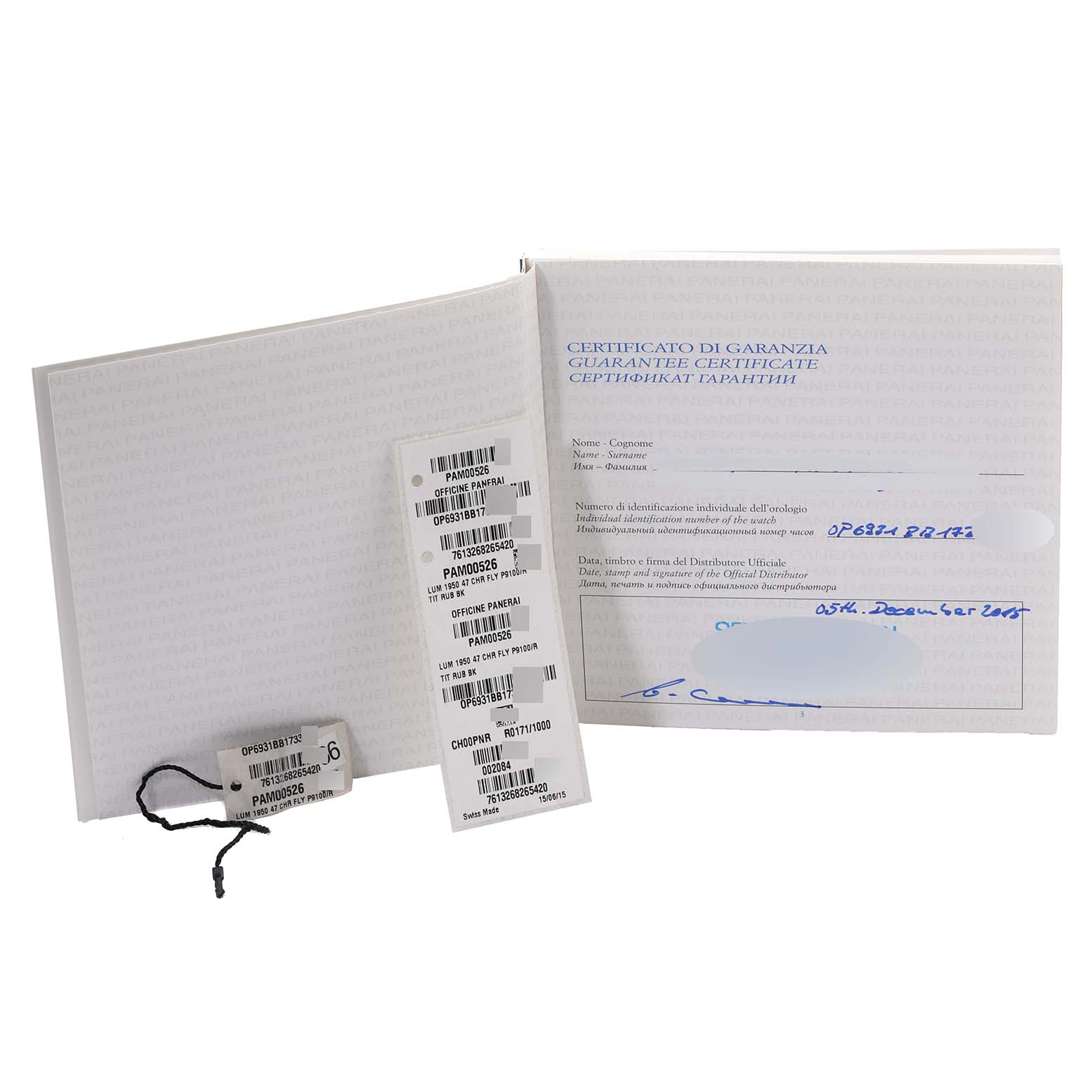 Shown are the guarantee certificate, tags, and paperwork for the Panerai Luminor PAM00526 Men's Titanium Black Dial PAM00526 Men's Titanium Black Dial model.